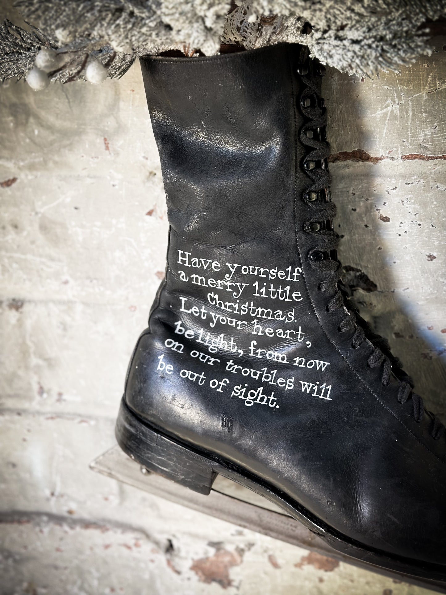 A beautiful vintage Christmas ice skate hand painted using traditional sign writer’s techniques and materials