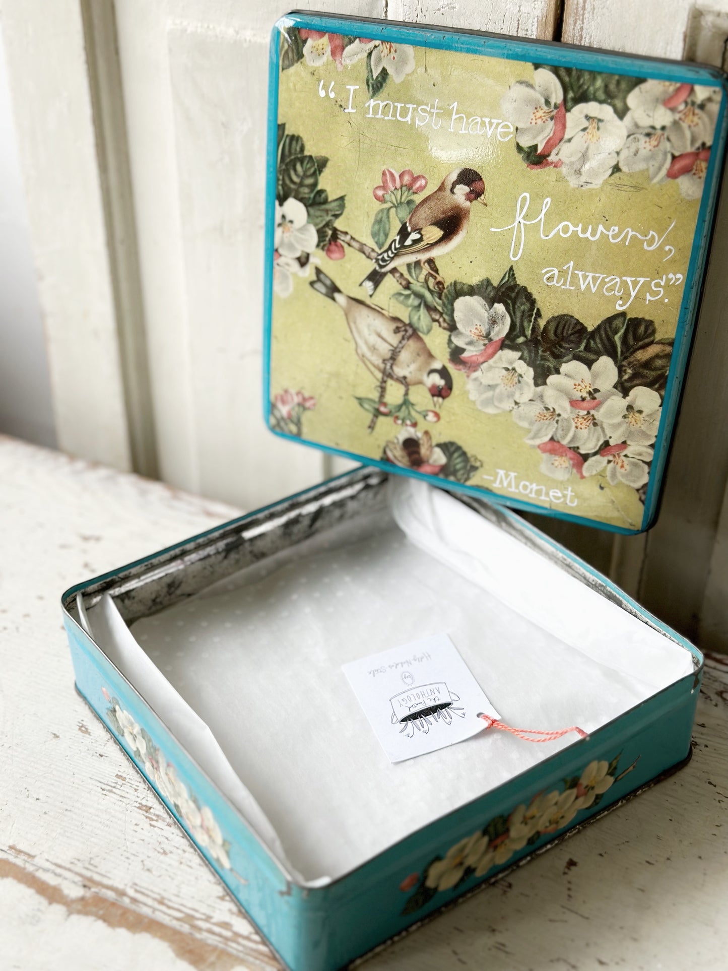 A pretty antique tin with a hand painted quote.
