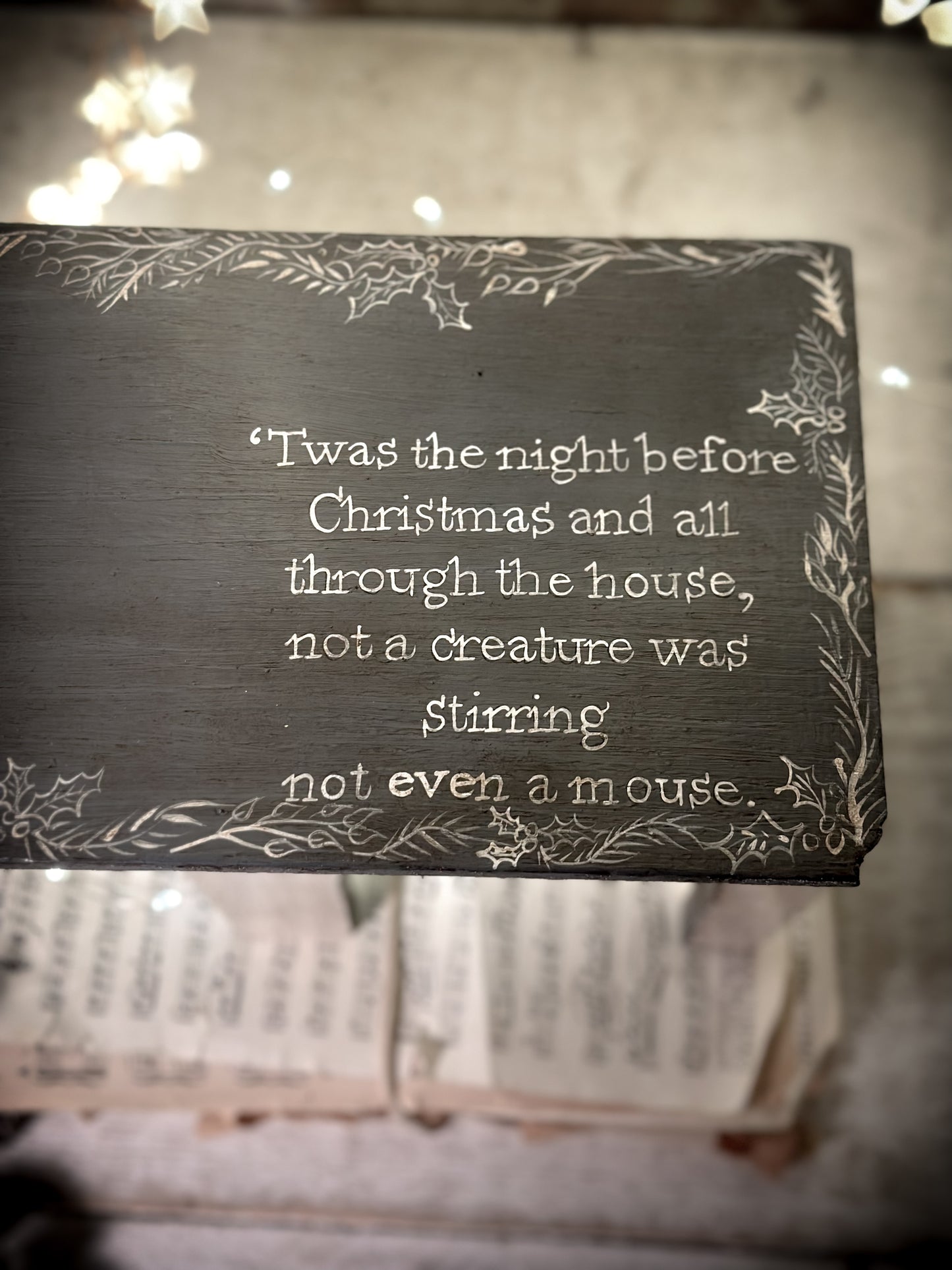 A hand painted quote on a vintage scratch built folk art model farm barn