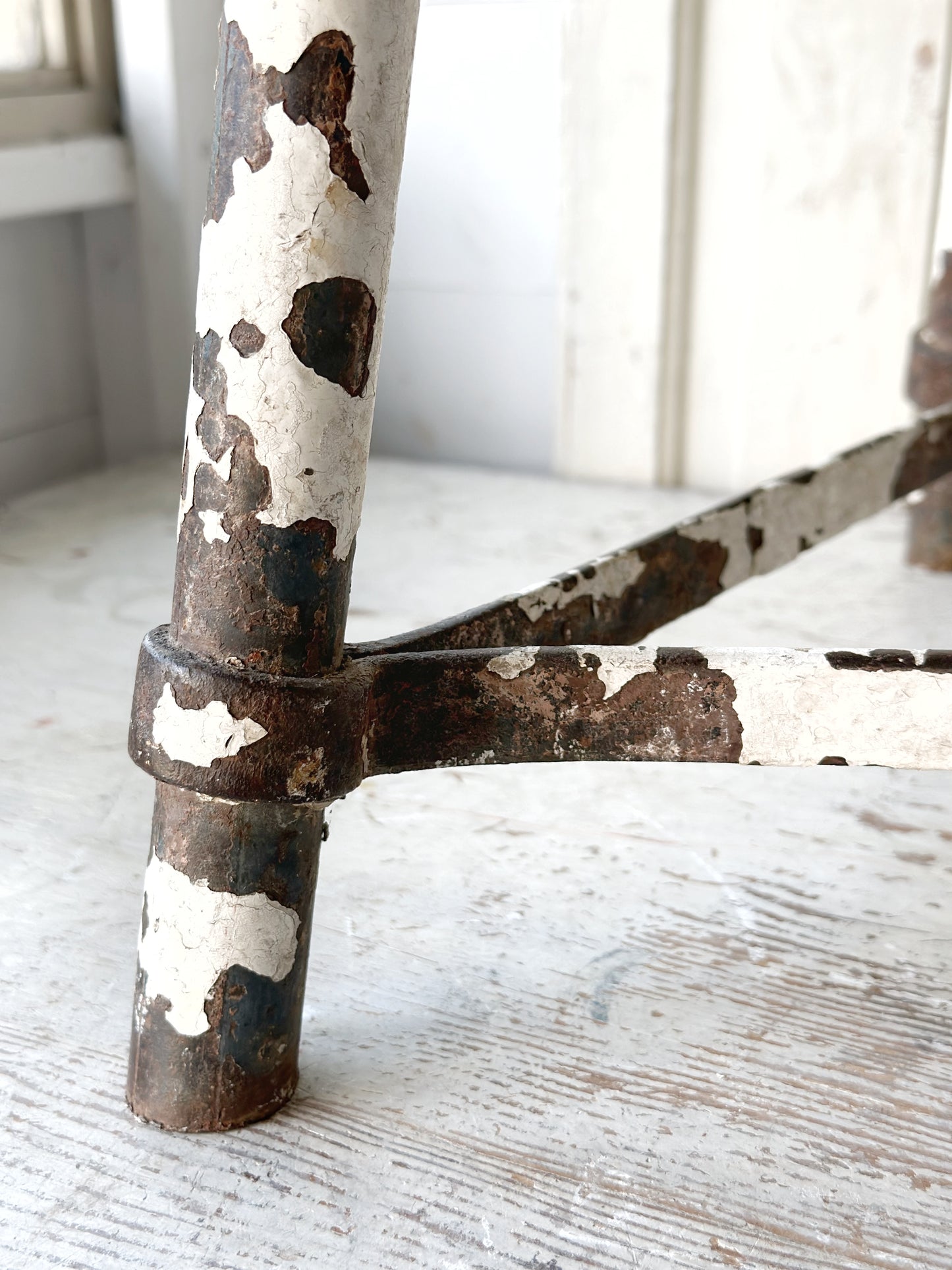 A chippy white French engineer’s stool 1930’s