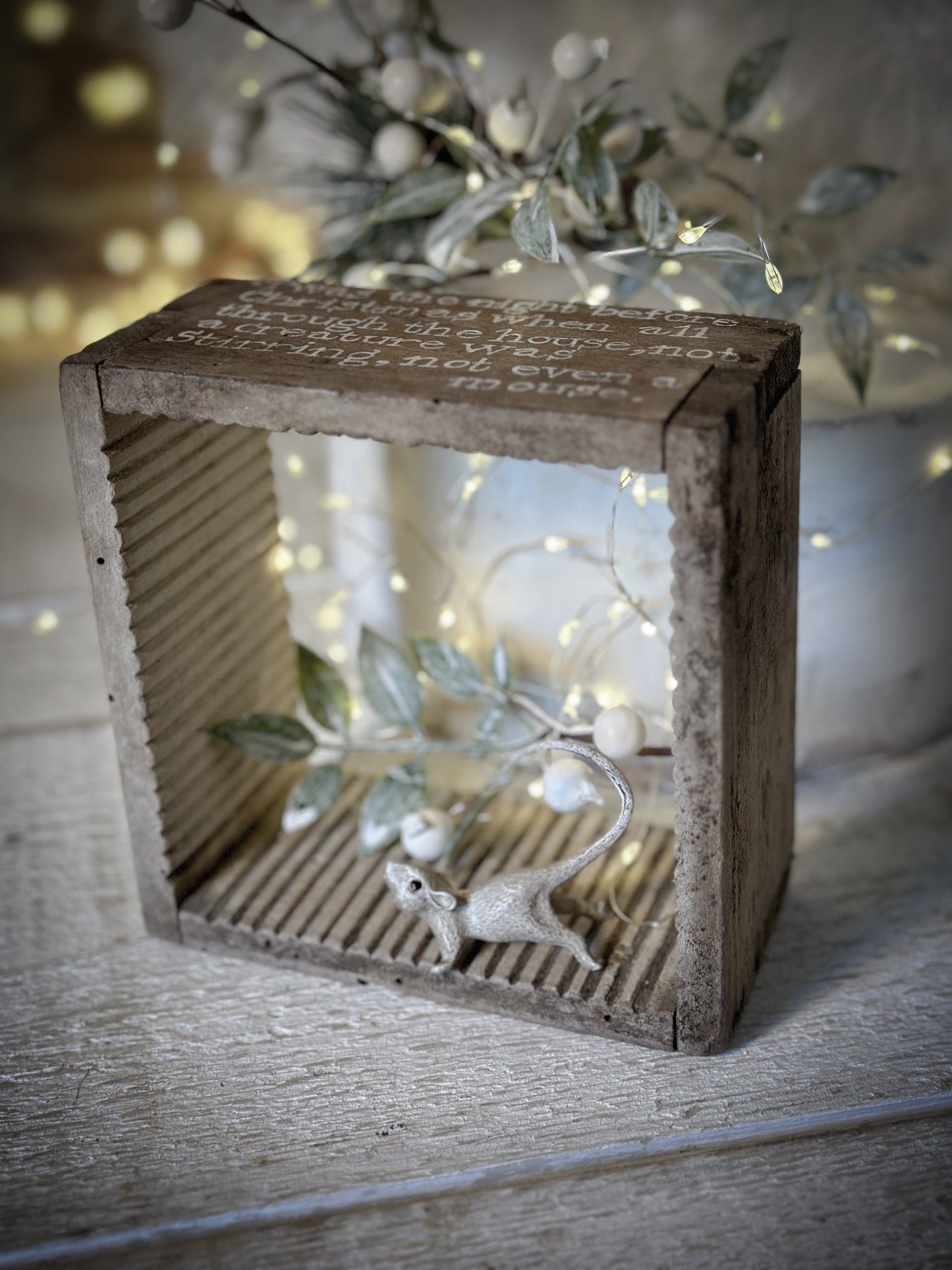A painted French cheese mould Christmas display