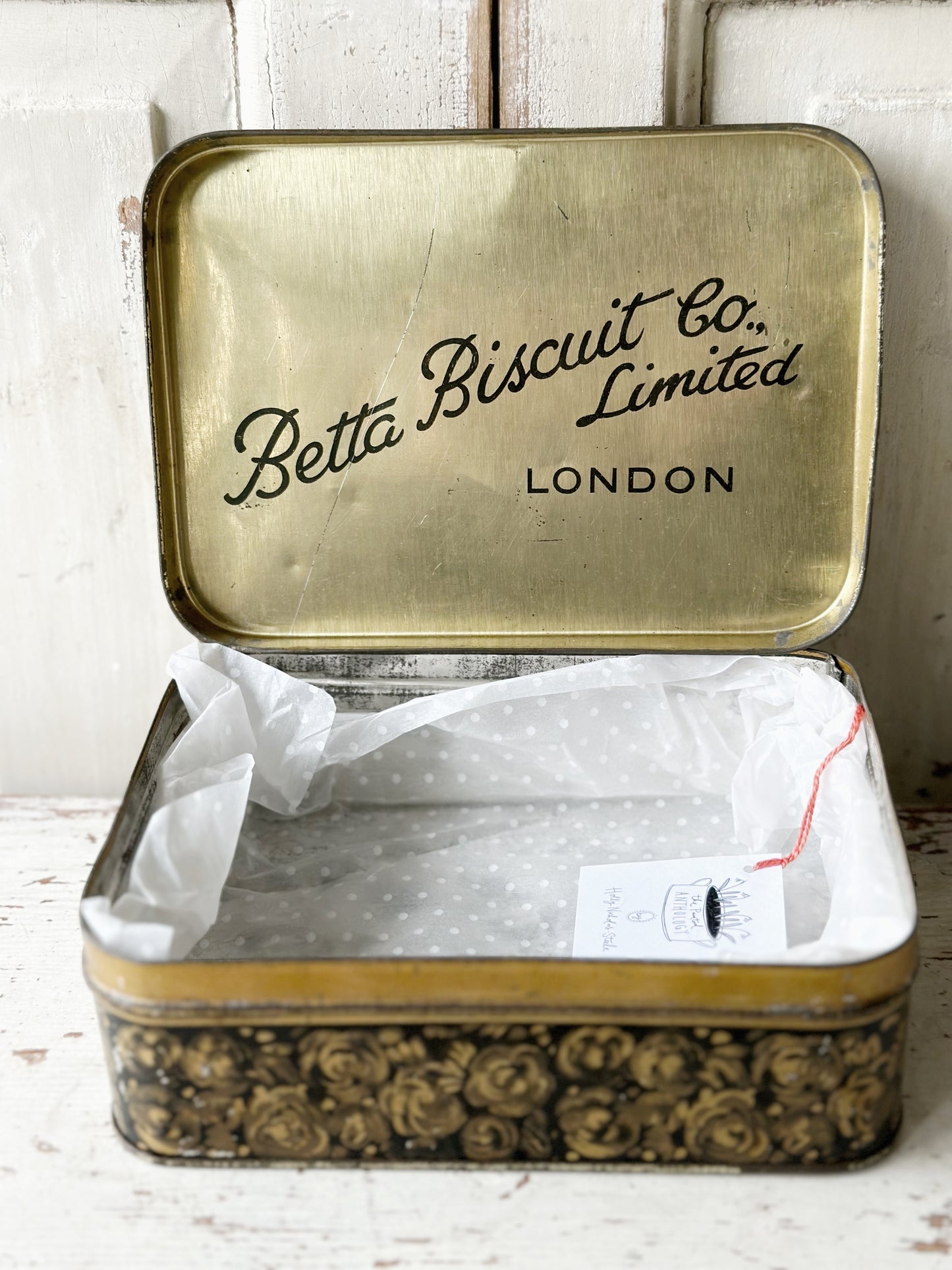 A pretty antique tin with a hand painted quote.