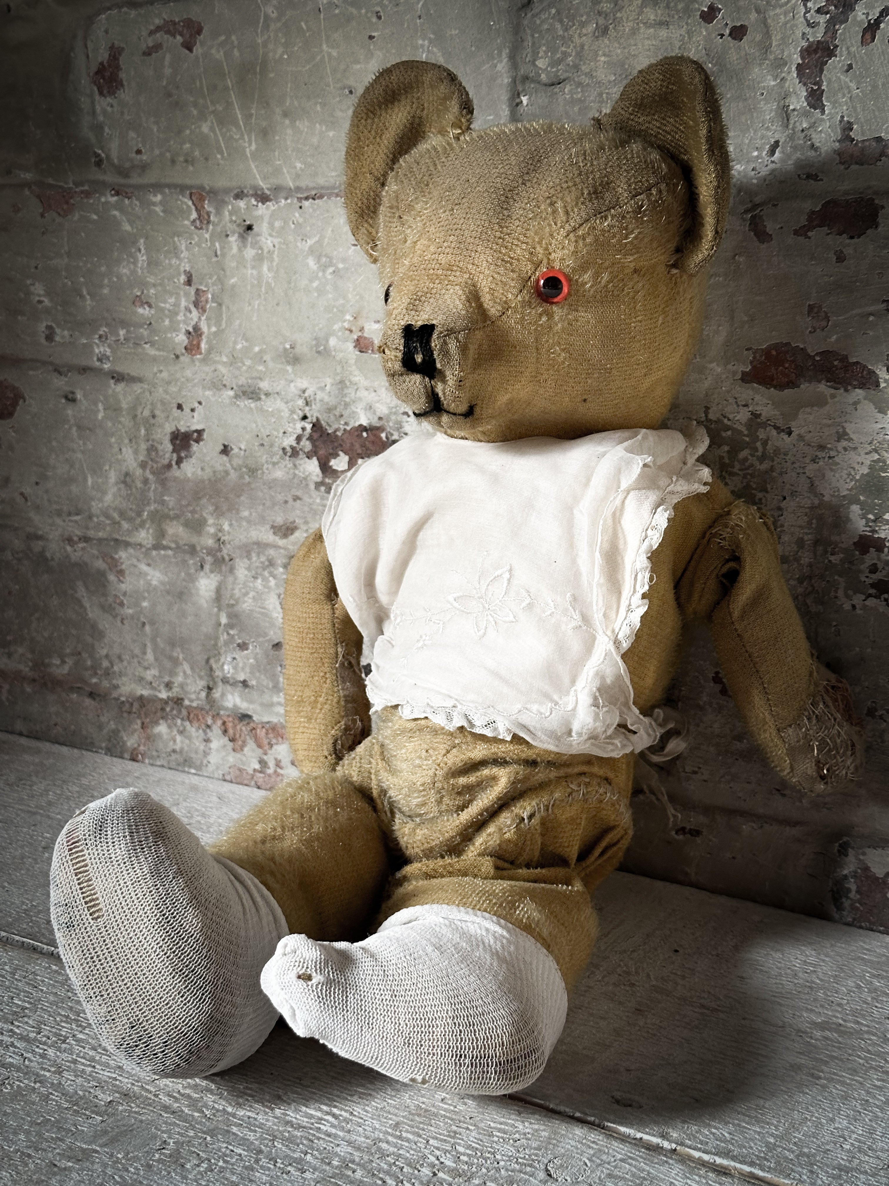 A wonderful well loved antique French teddy bear