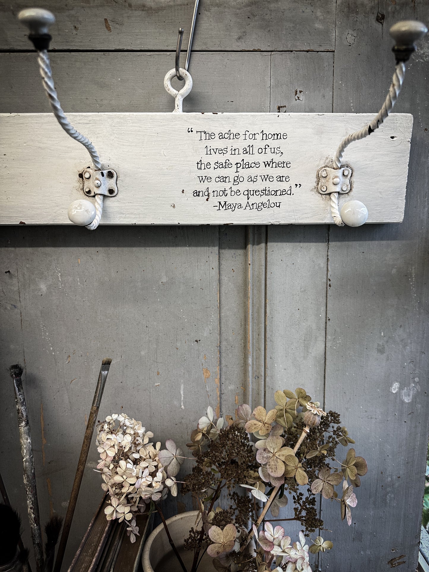 A Vintage Wooden French Coat Peg With Hand Painted Quote