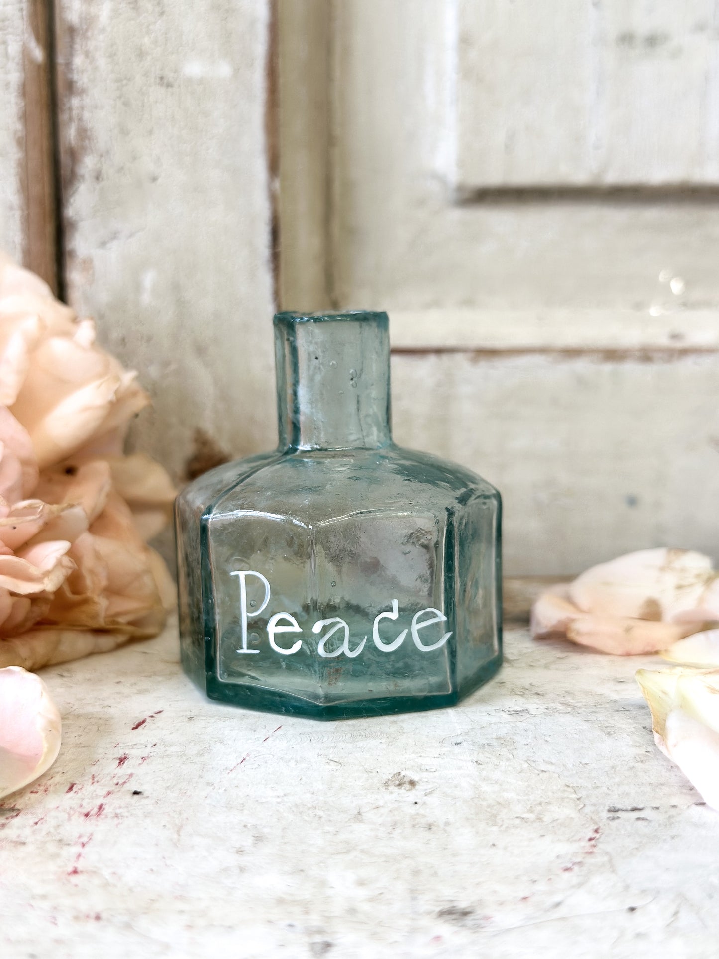 A beautiful Victorian bottle with a hand painted quote
