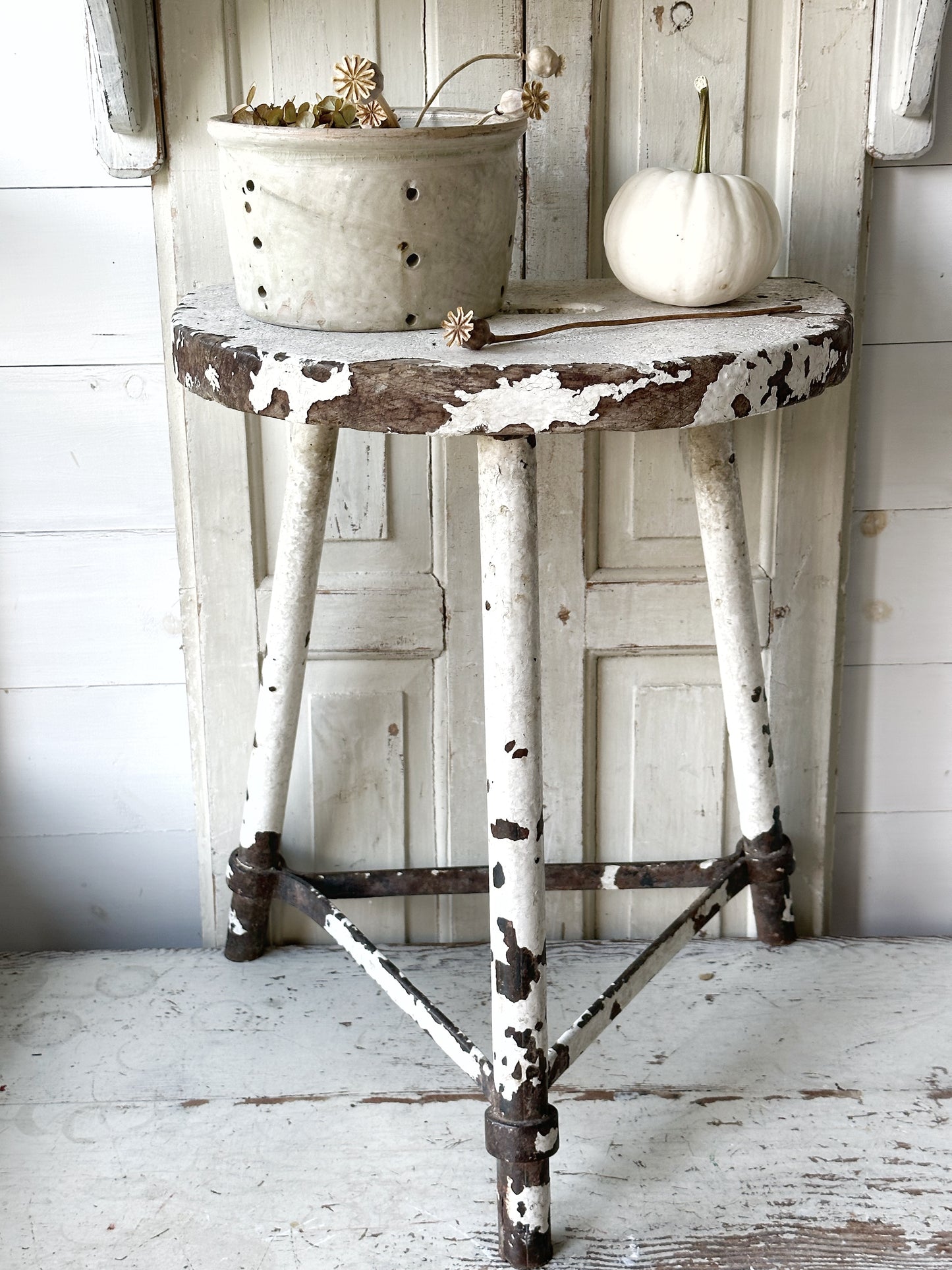 A chippy white French engineer’s stool 1930’s
