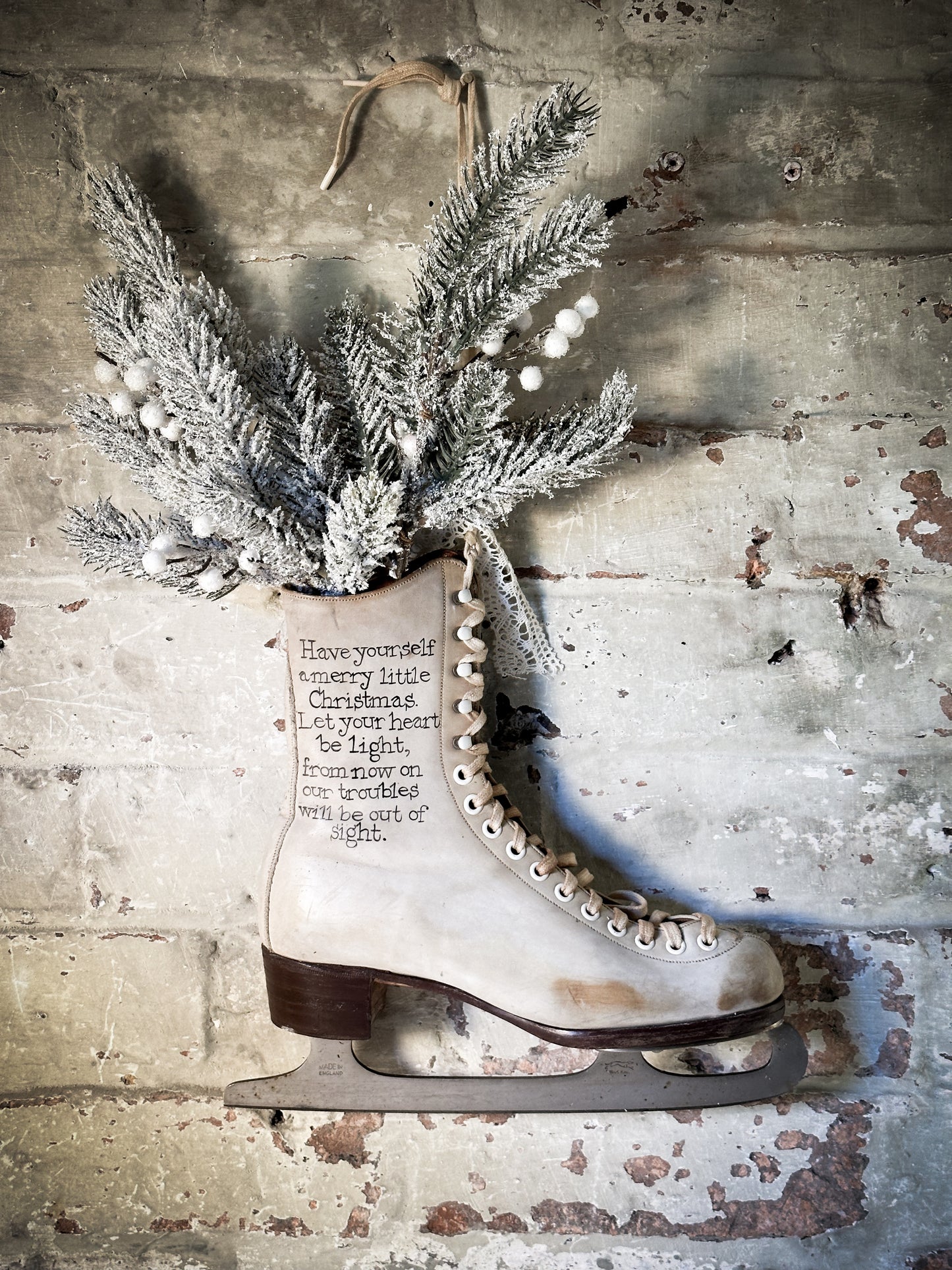 A beautiful vintage Christmas ice skate hand painted using traditional sign writer’s techniques and materials