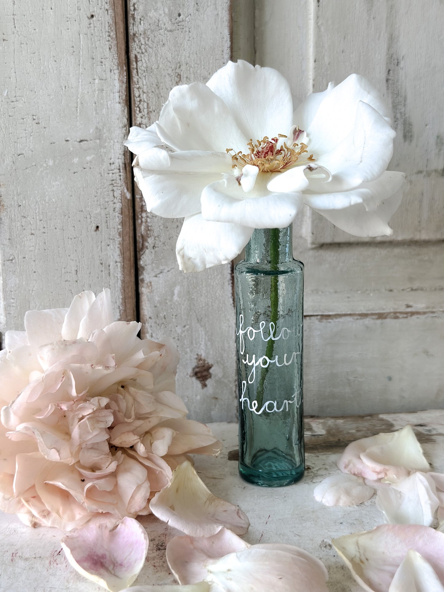 A beautiful Victorian bottle with a hand painted quote
