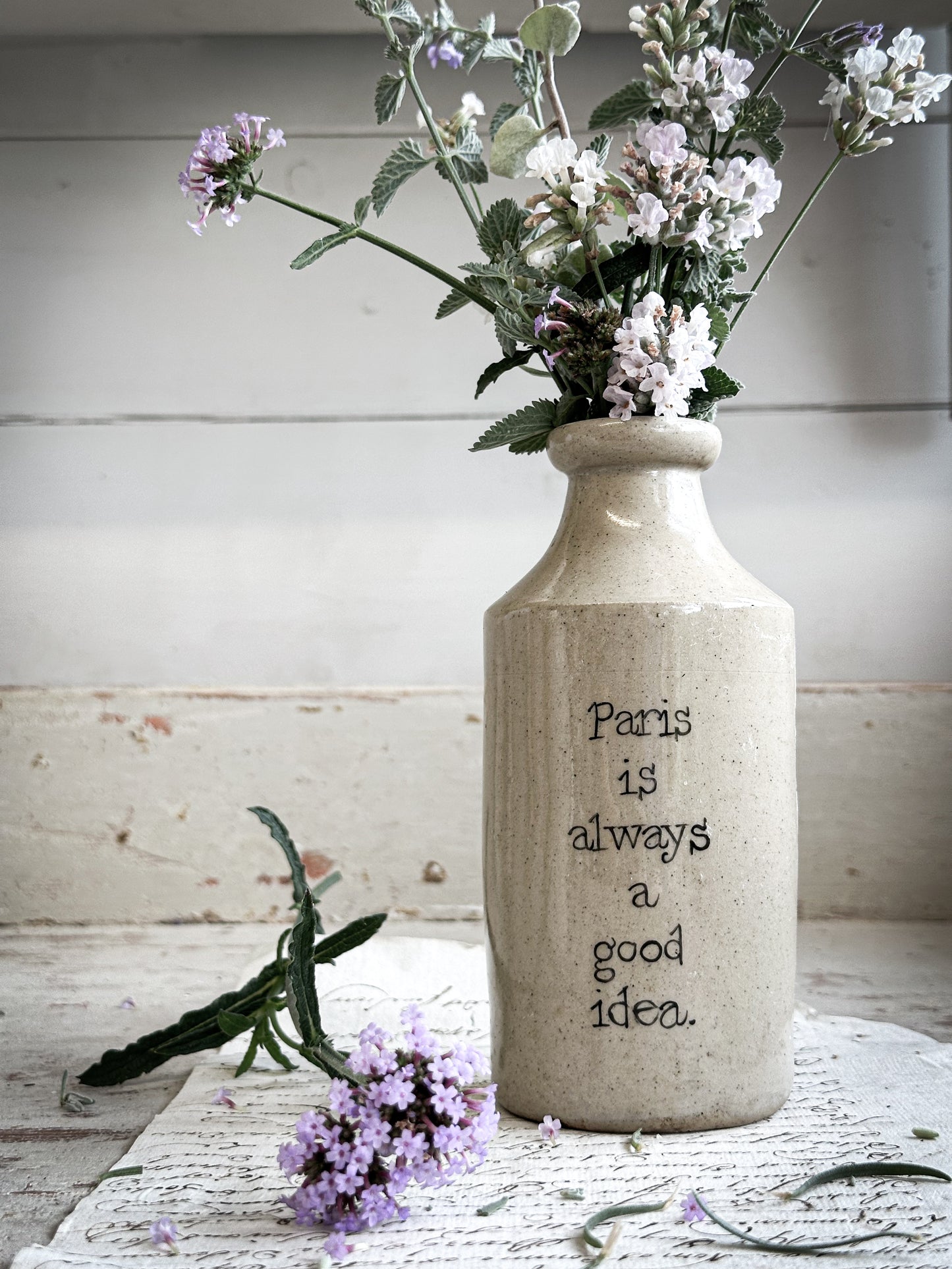 A Victorian unearthed short stoneware pottery bottle with a hand painted quote