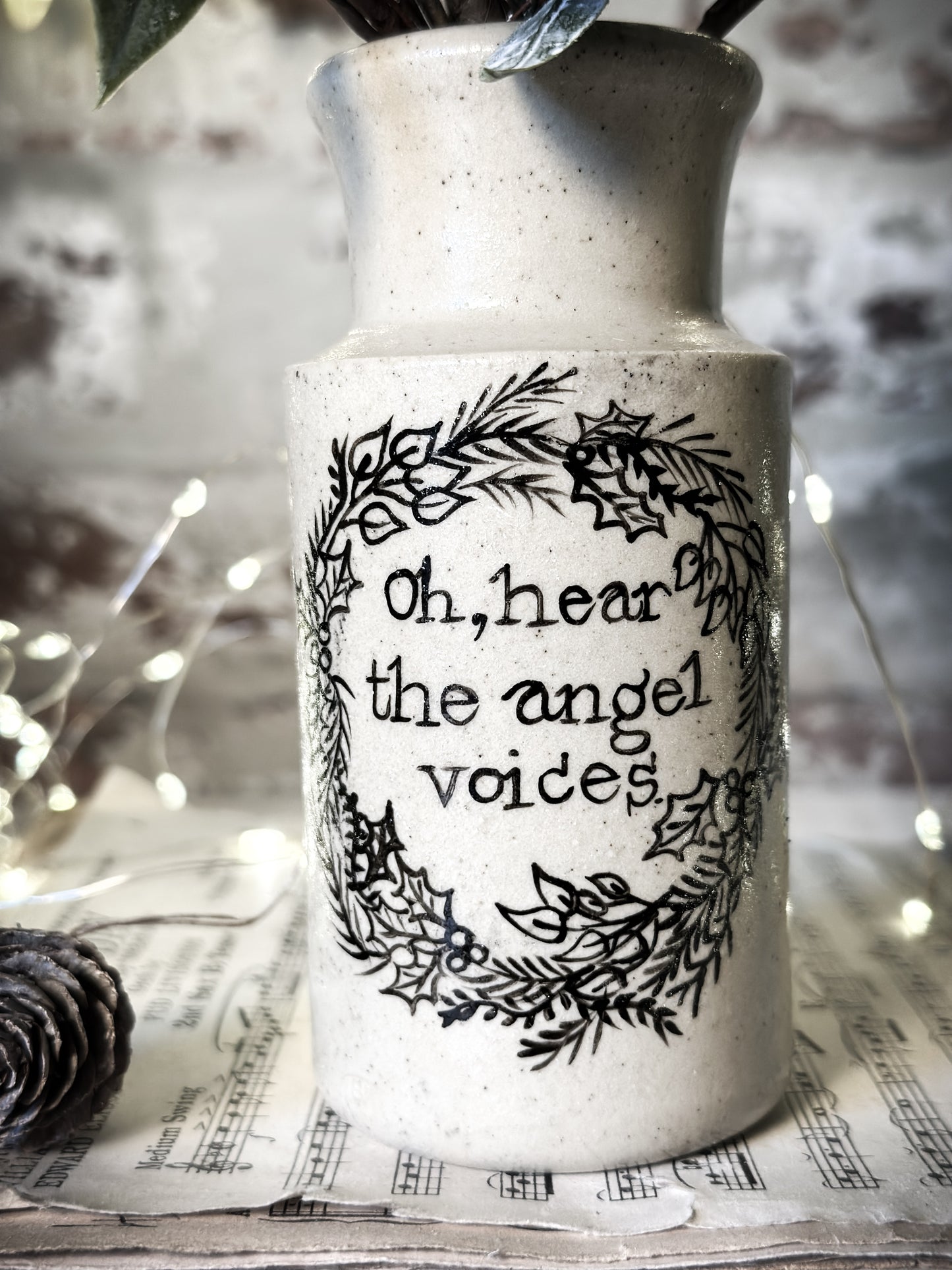 A hand painted and illustrated vintage Victorian bottle