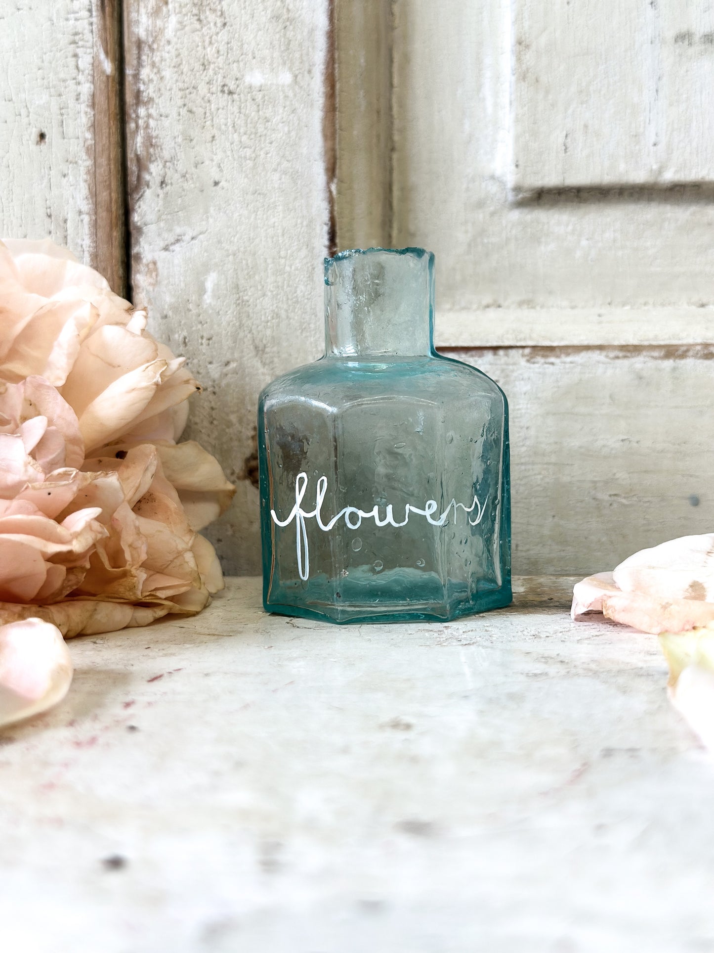 A beautiful Victorian bottle with a hand painted quote