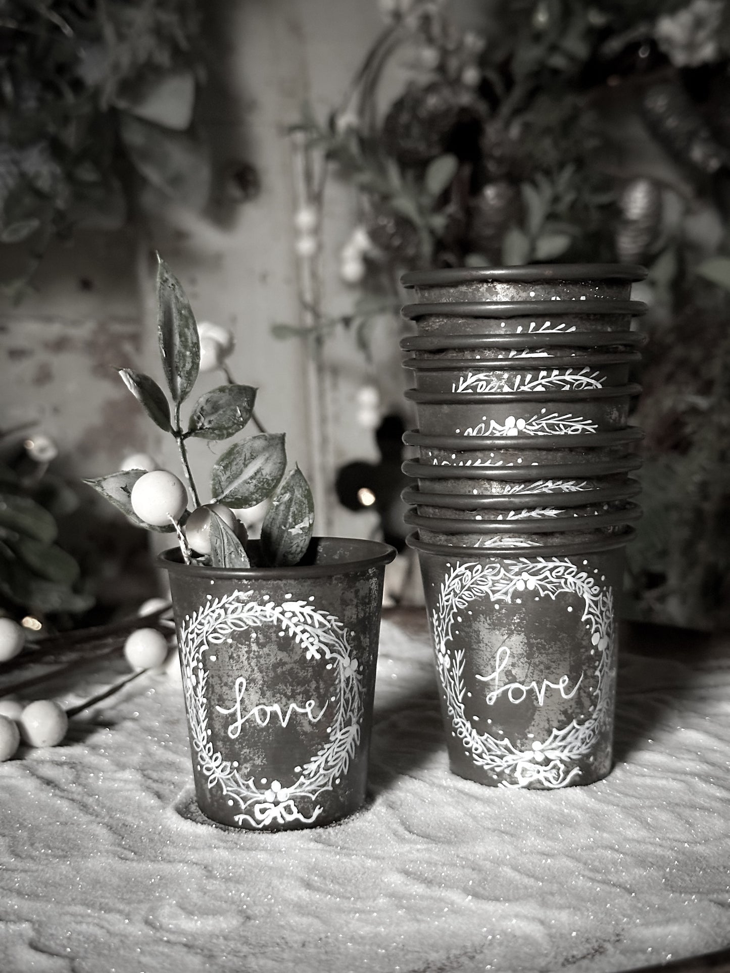 A pretty hand painted Dariole tin tea light holder