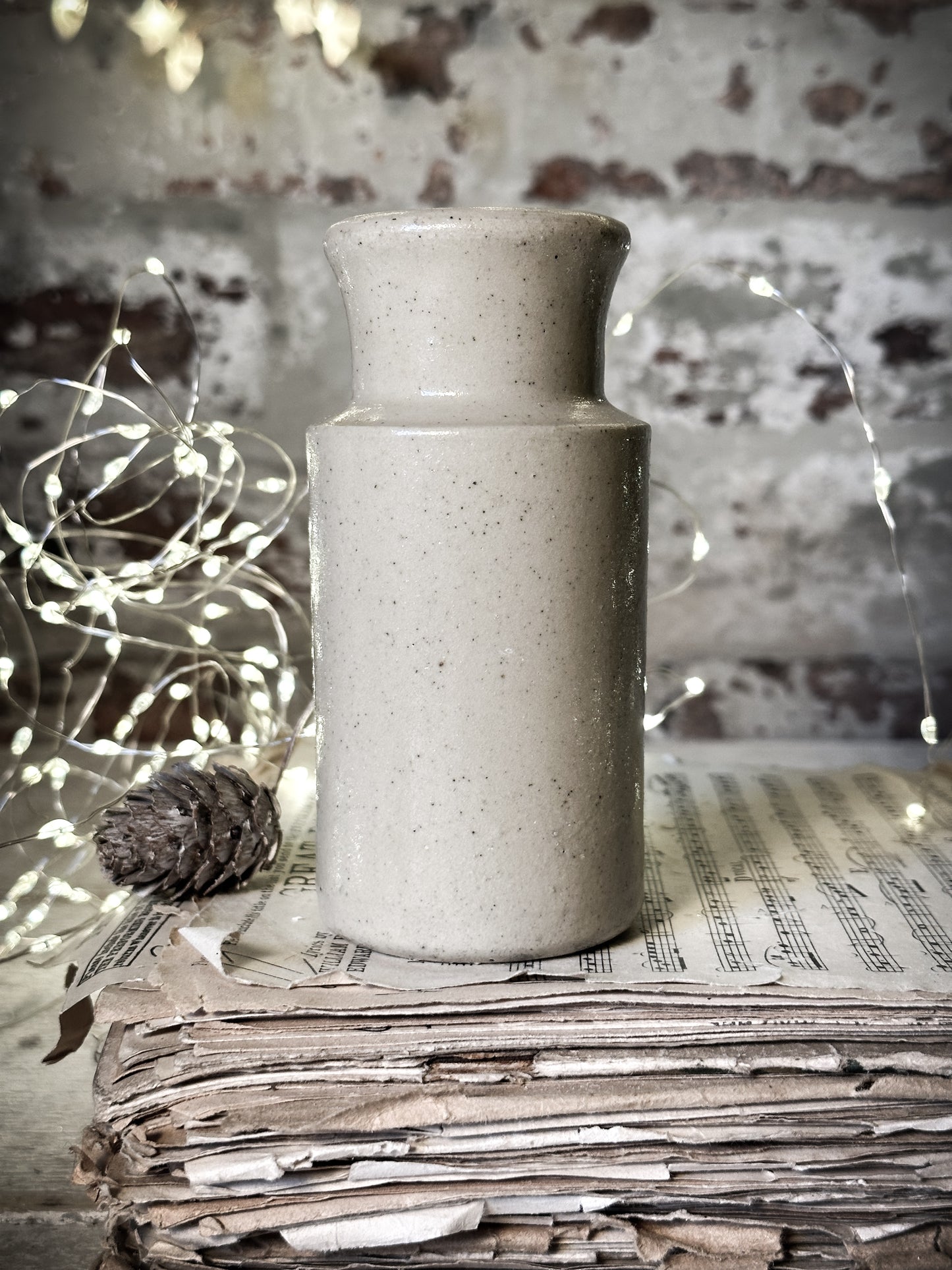 A hand painted and illustrated vintage Victorian bottle