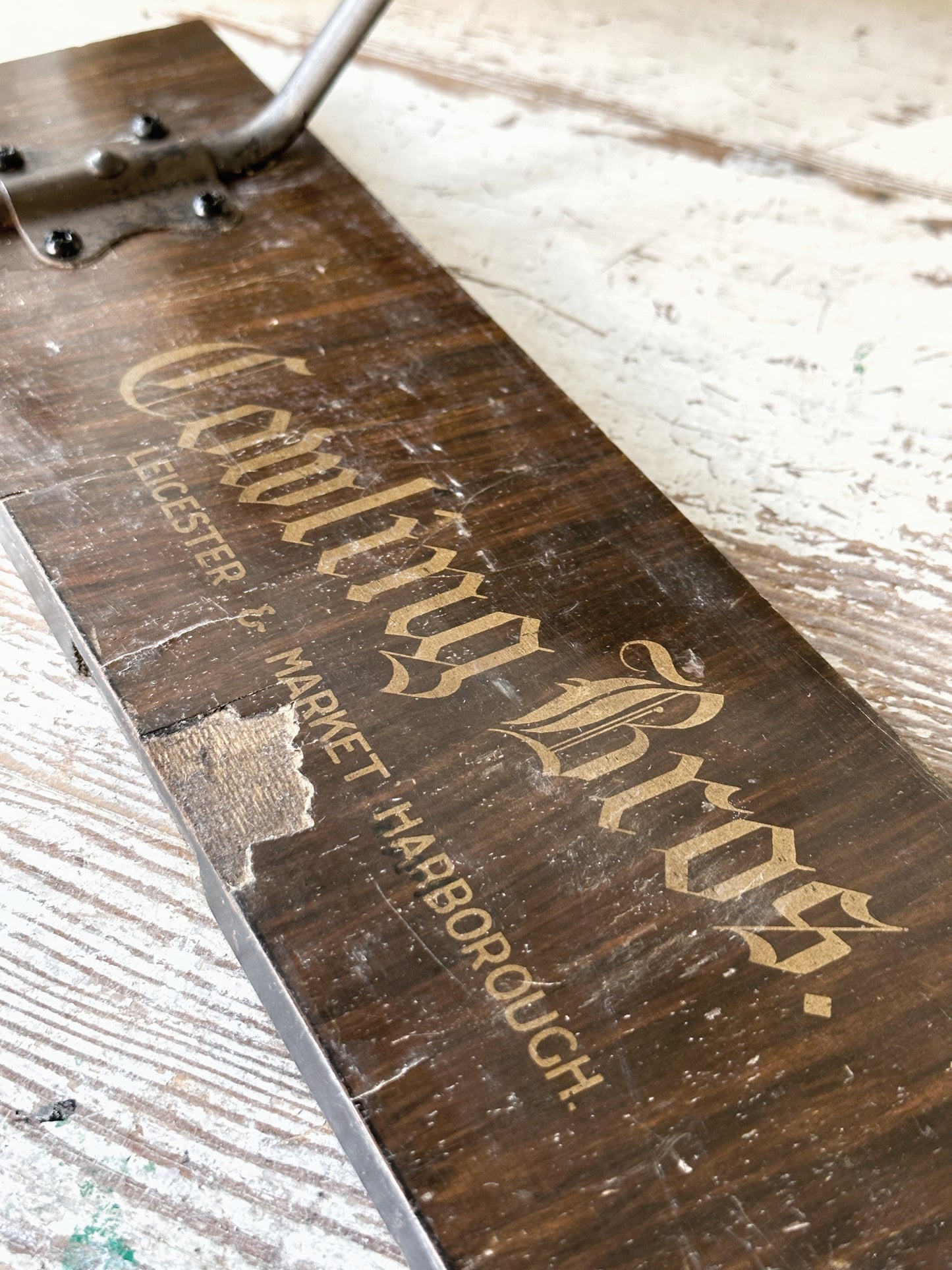 Salvaged sign written drawer front coat pegs