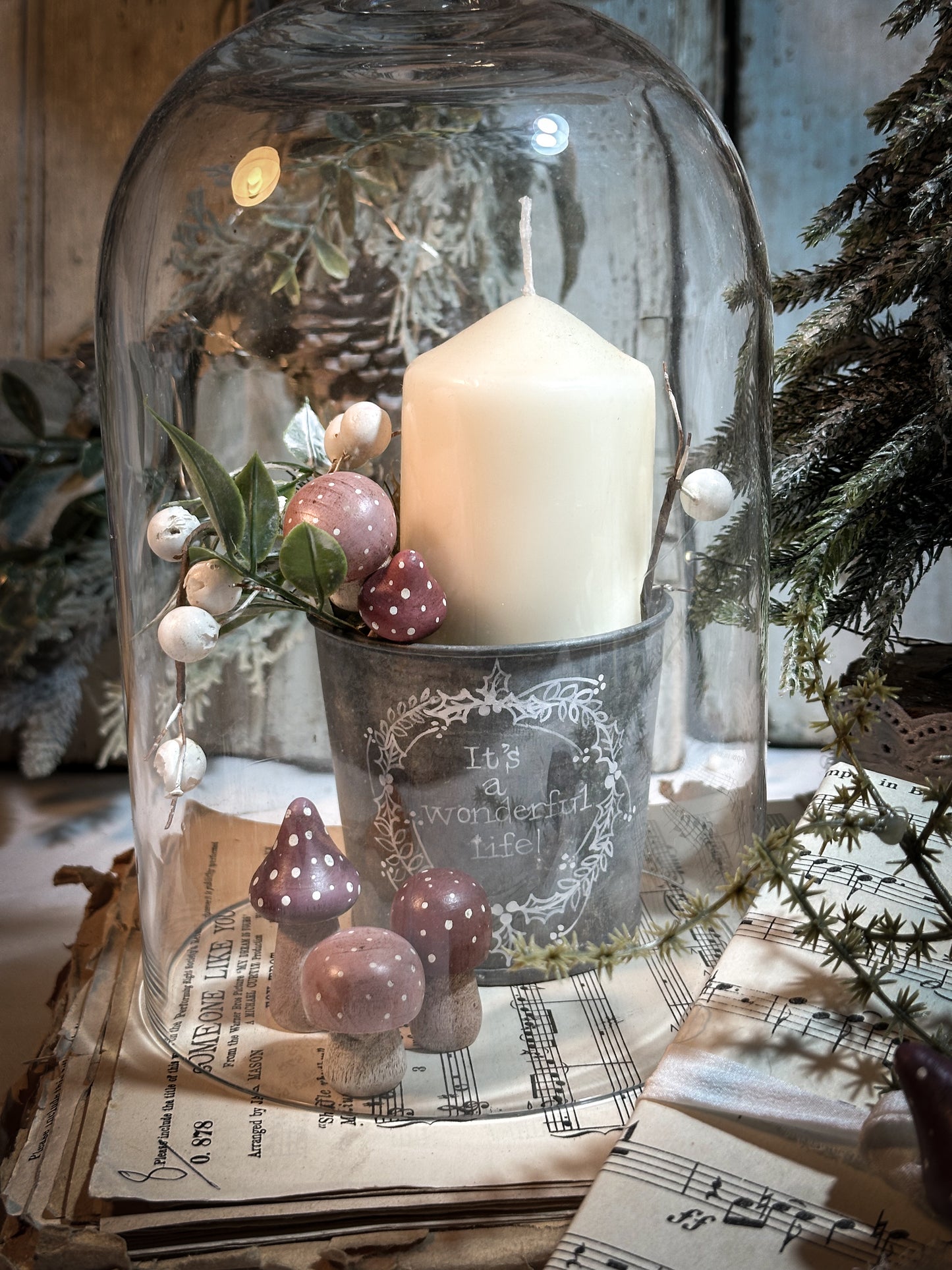 A wooden hand painted and trimmed Christmas village toadstool