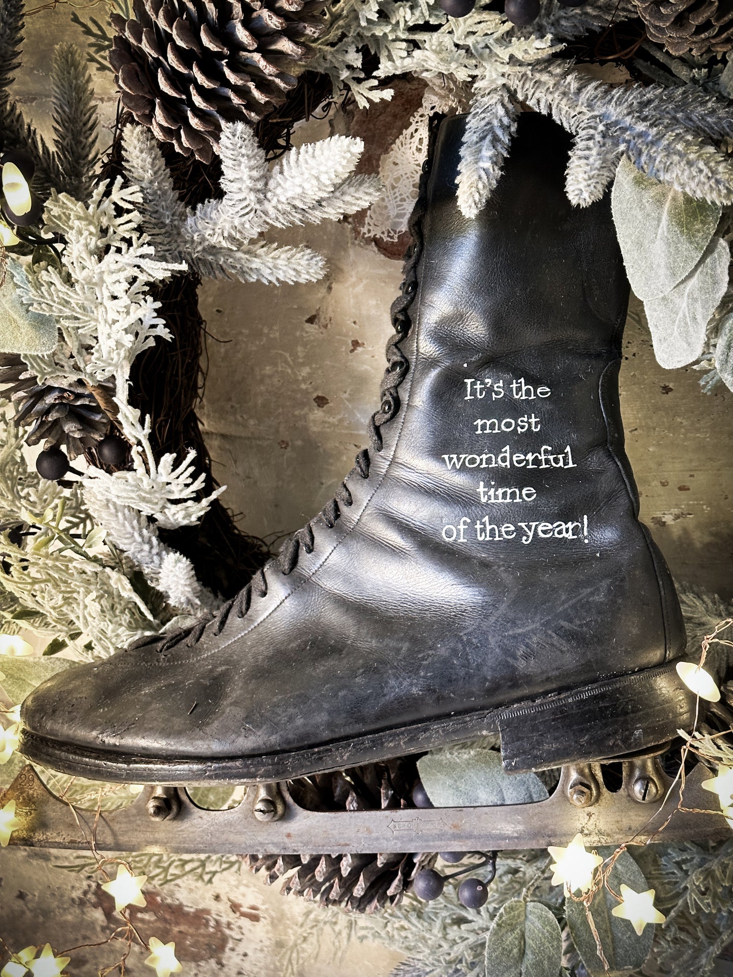 A beautiful vintage Christmas ice skate hand painted using traditional sign writer’s techniques and materials