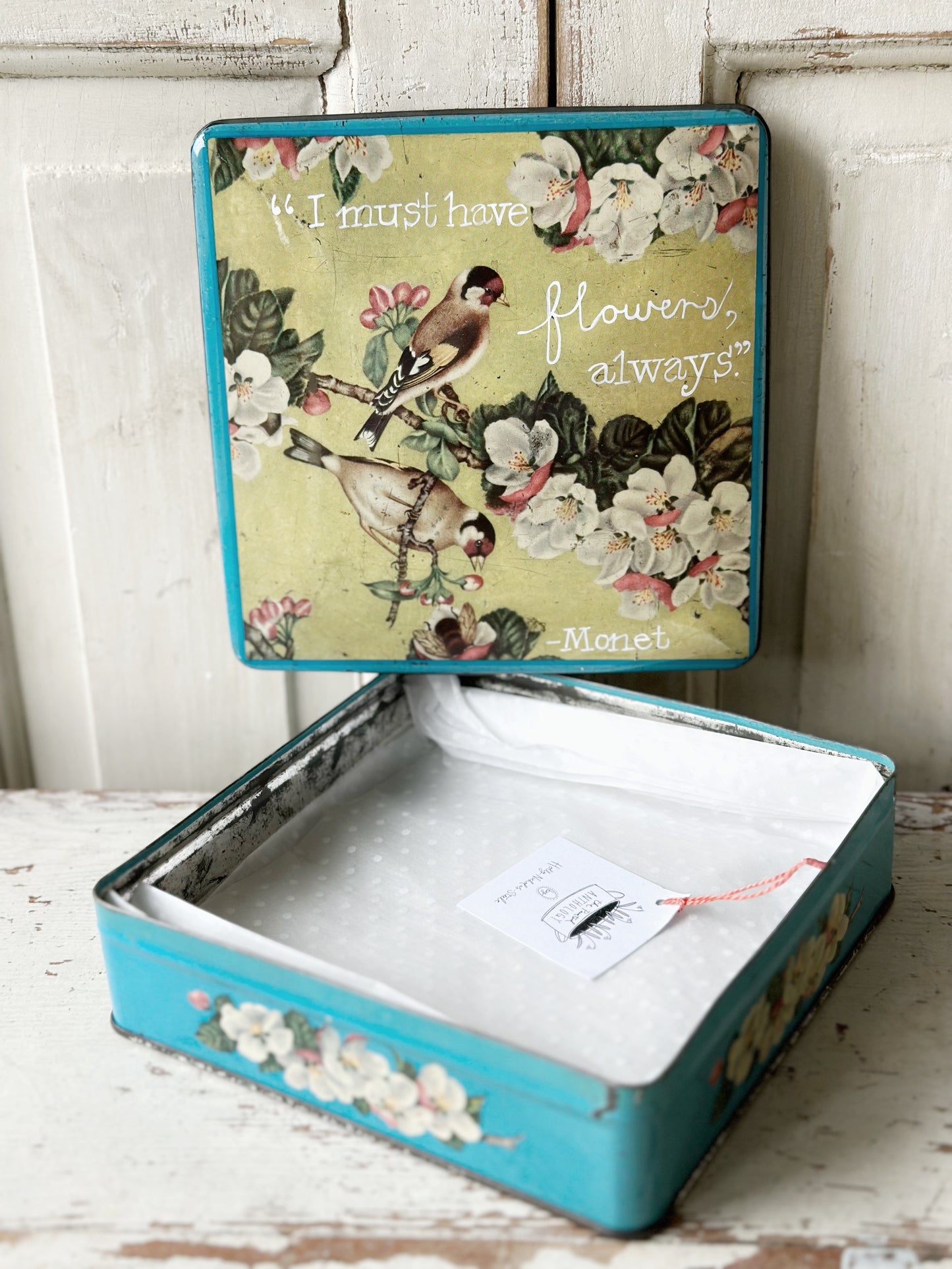 A pretty antique tin with a hand painted quote.