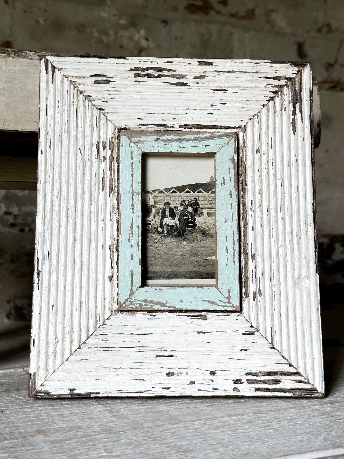 A framed day at the seaside antique photograph in a Luna design frame