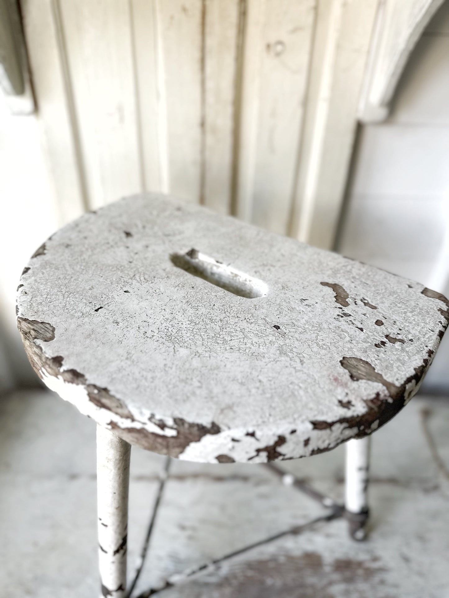 A chippy white French engineer’s stool 1930’s