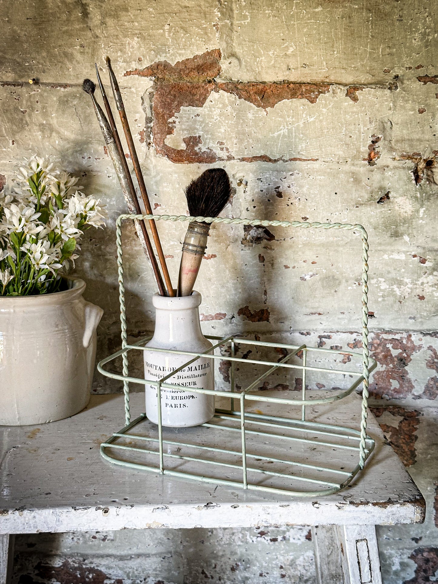 A Vintage French Wire Bottle Rack