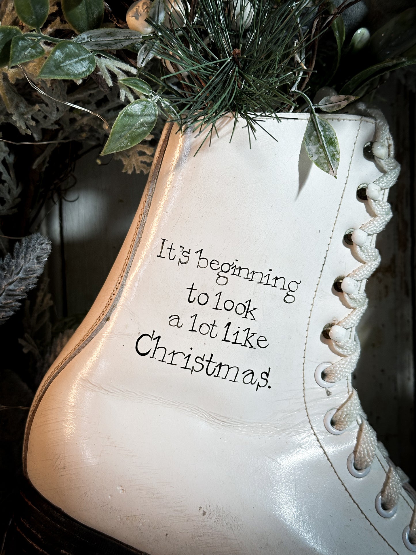 A beautiful vintage Christmas ice skate hand painted using traditional sign writer’s techniques and materials