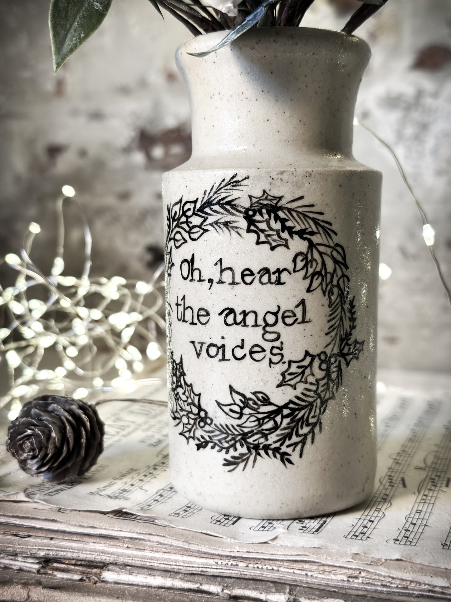 A hand painted and illustrated vintage Victorian bottle