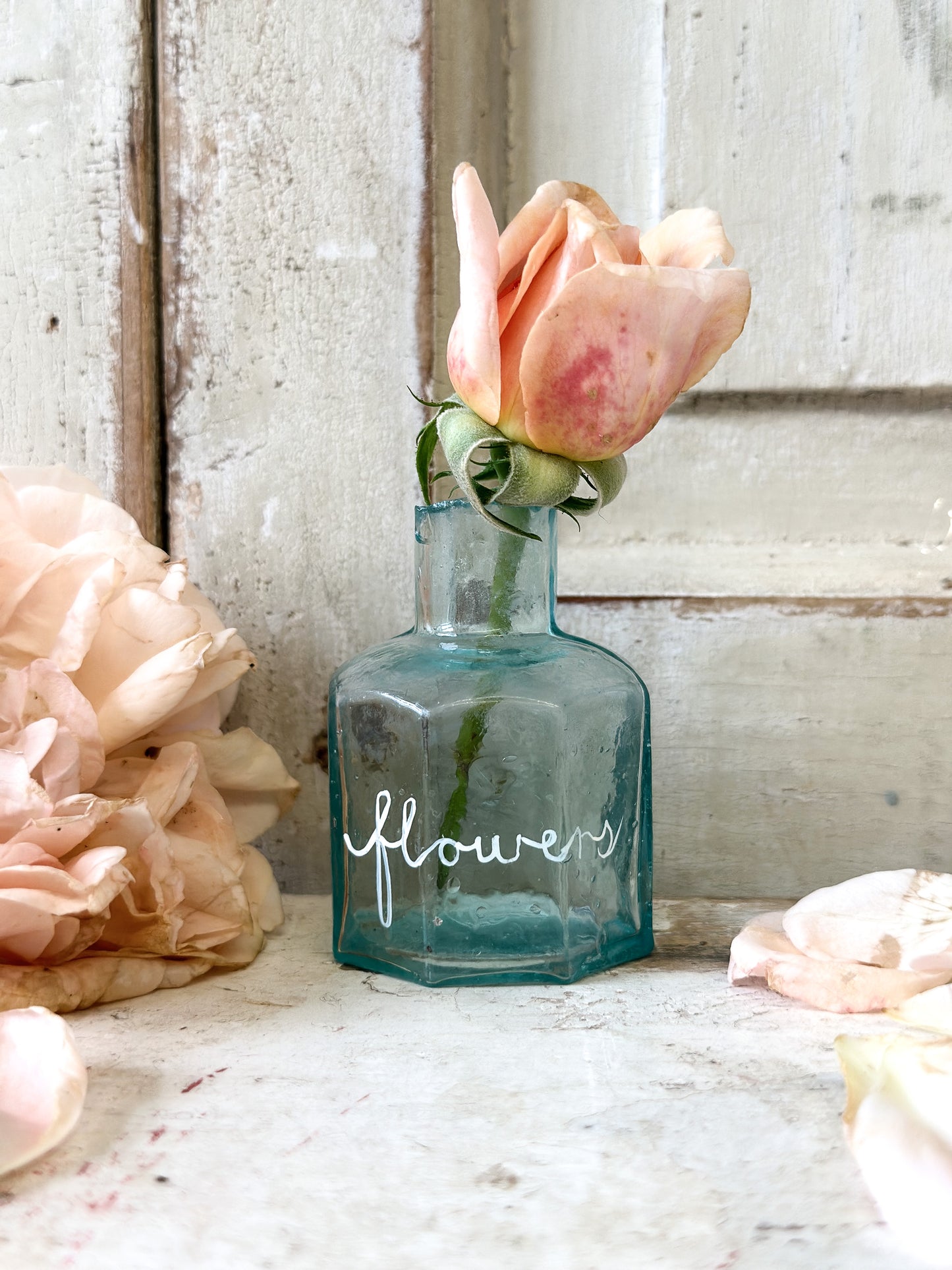 A beautiful Victorian bottle with a hand painted quote