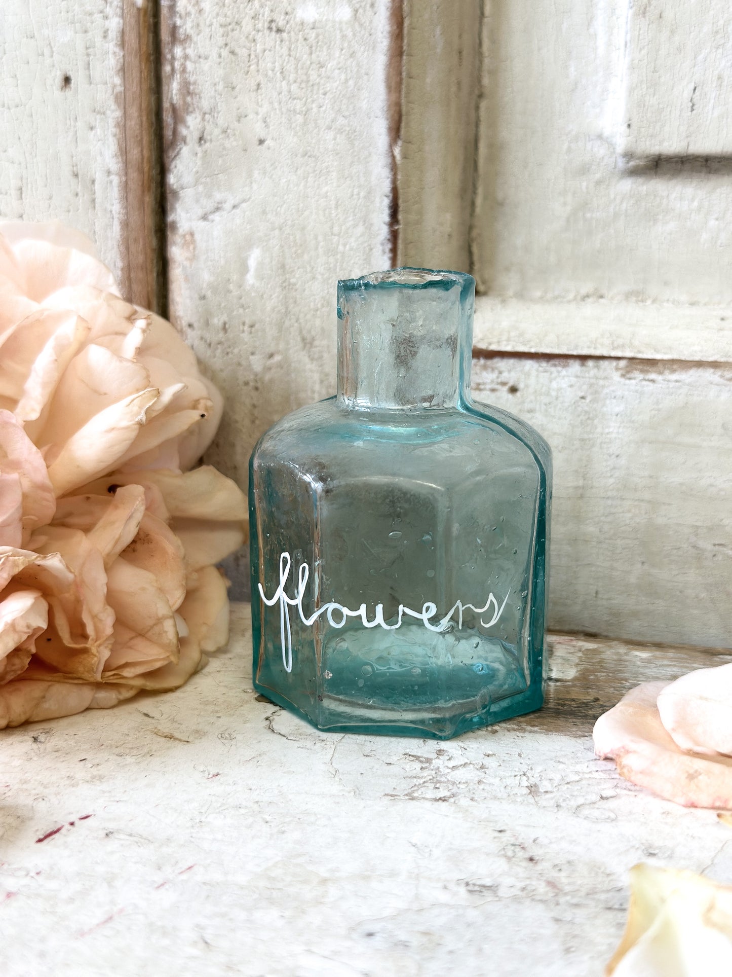 A beautiful Victorian bottle with a hand painted quote