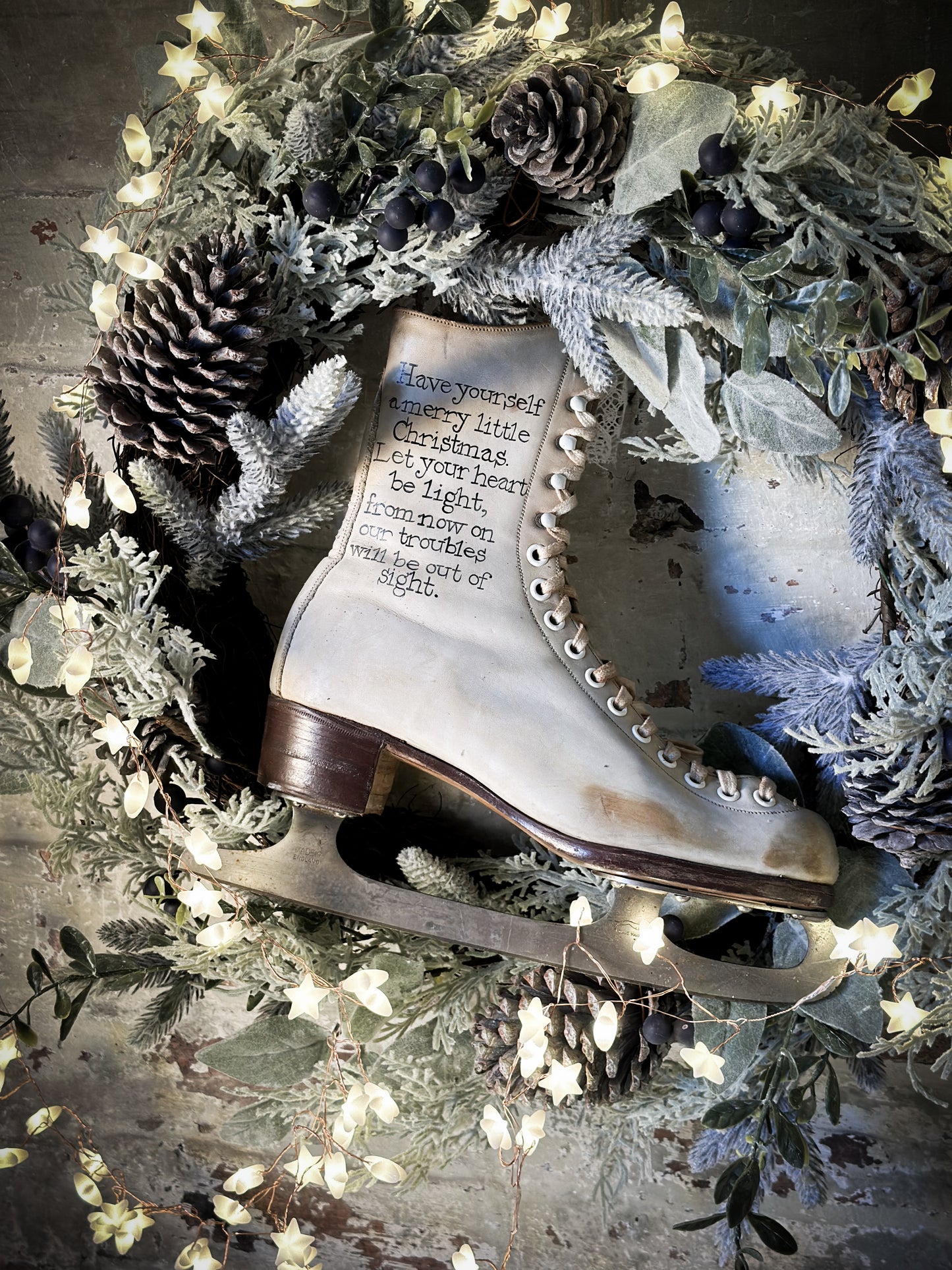 A beautiful vintage Christmas ice skate hand painted using traditional sign writer’s techniques and materials