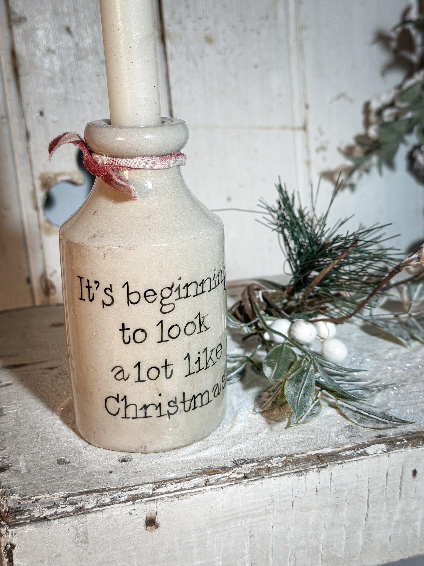 A Victorian unearthed stoneware pottery tall bottle with a hand painted quote