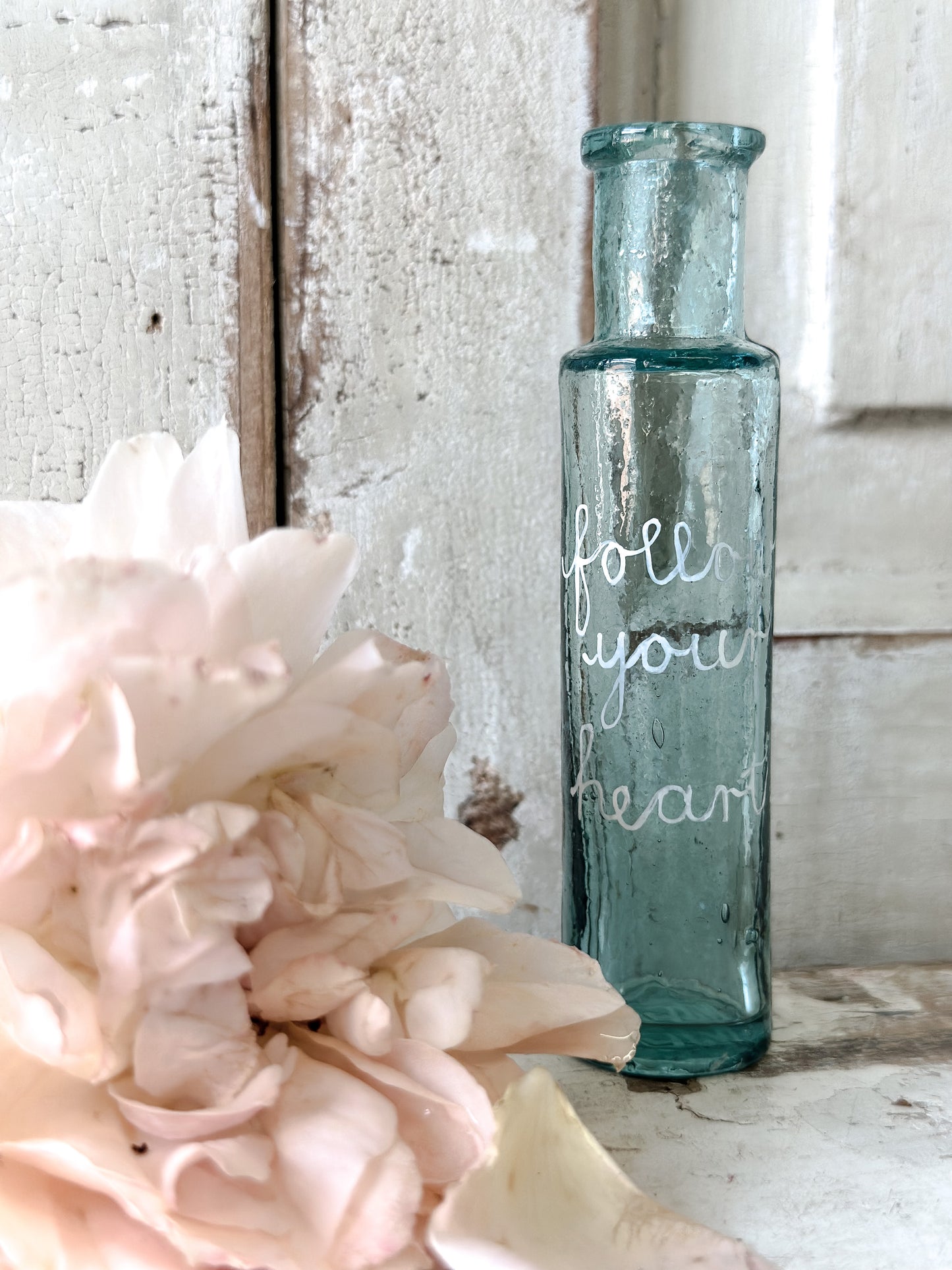 A beautiful Victorian bottle with a hand painted quote