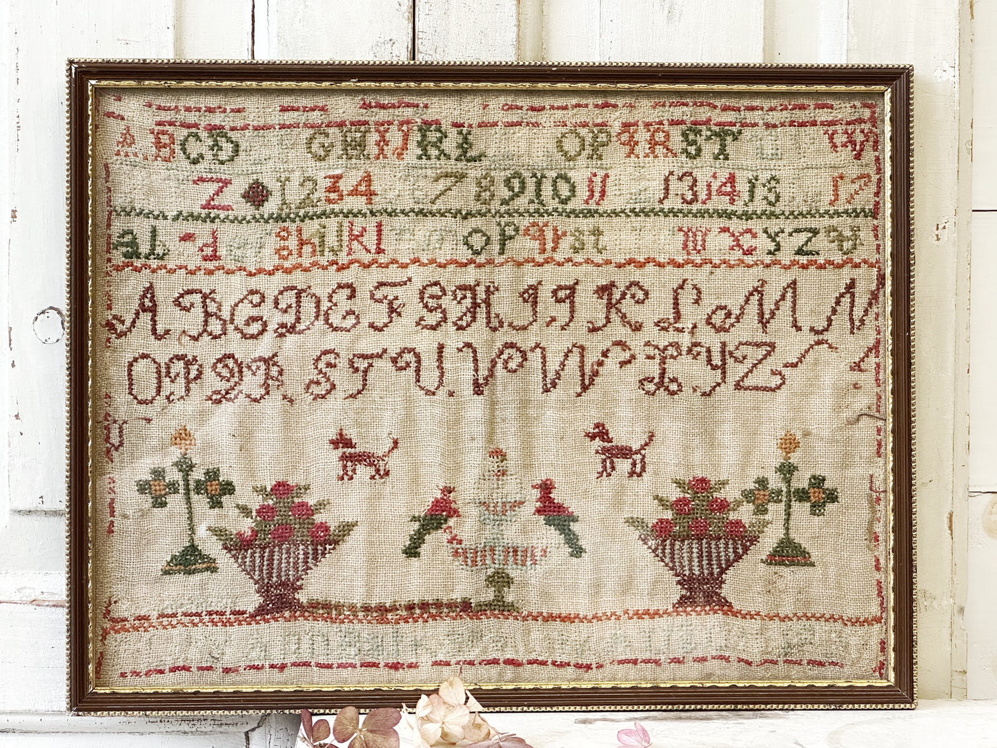 A beautiful 19th century colourful antique needlework sampler