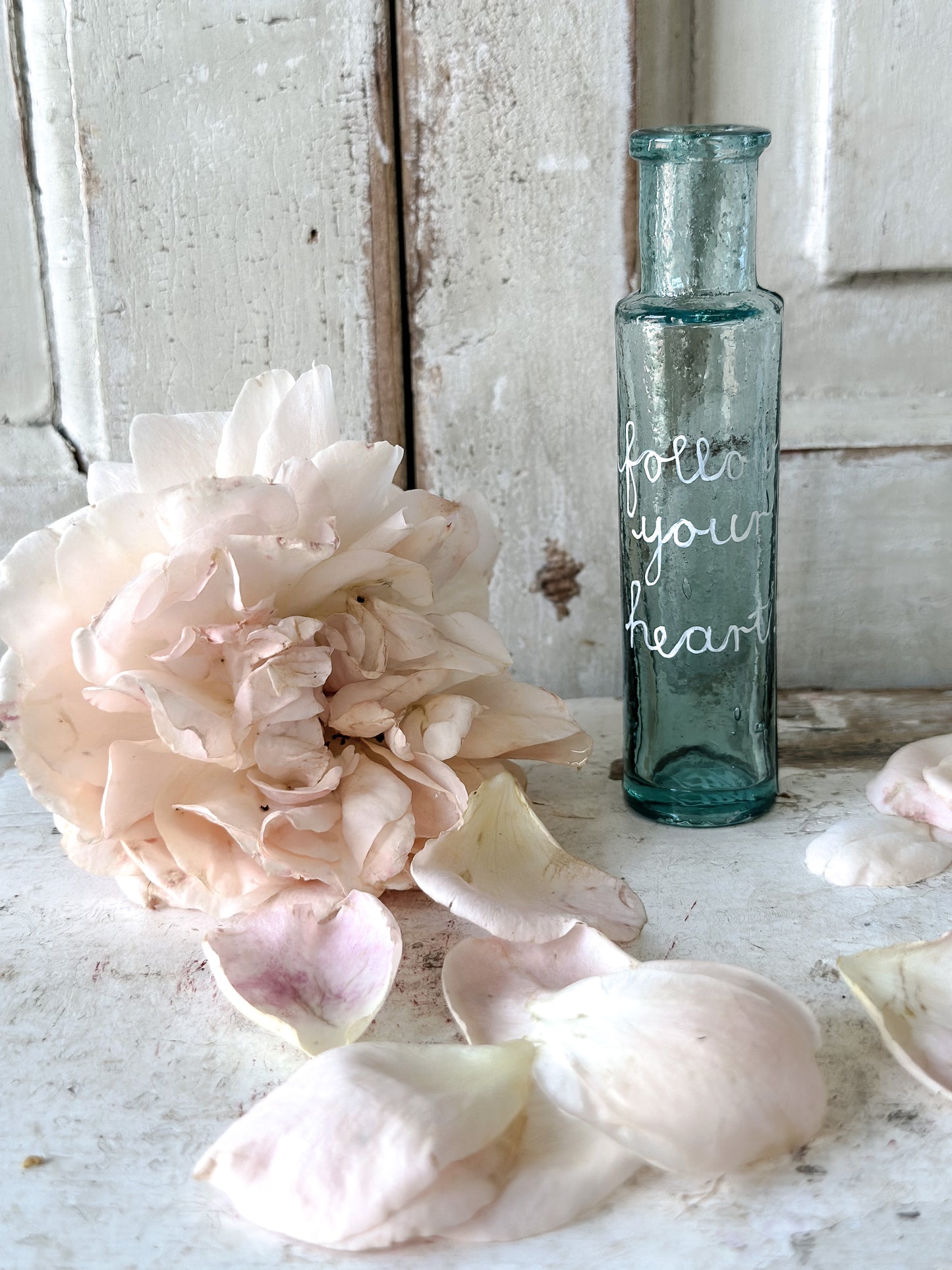 A beautiful Victorian bottle with a hand painted quote