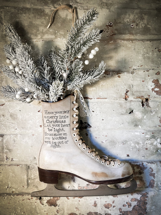 A beautiful vintage Christmas ice skate hand painted using traditional sign writer’s techniques and materials
