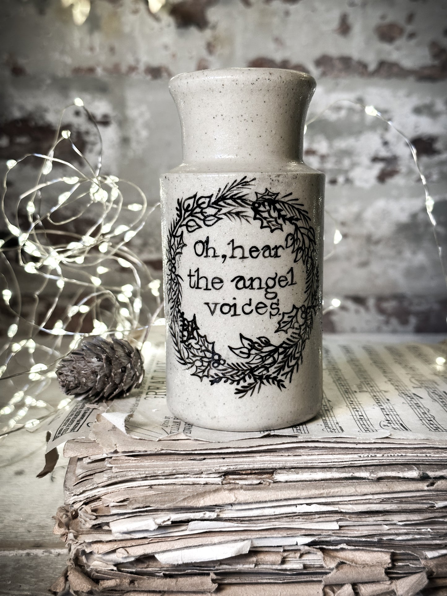 A hand painted and illustrated vintage Victorian bottle