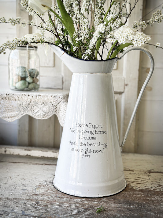 A hand painted quote on a beautiful Vintage white enamelware jug