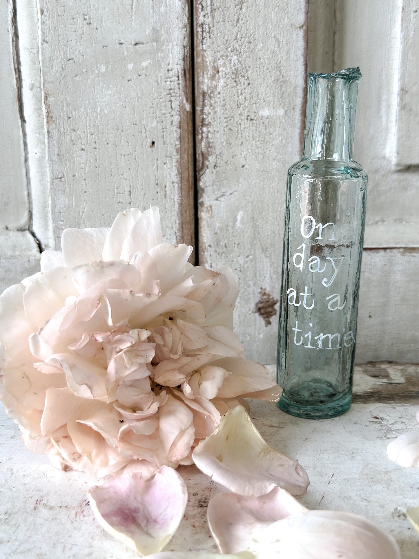 A beautiful Victorian bottle with a hand painted quote