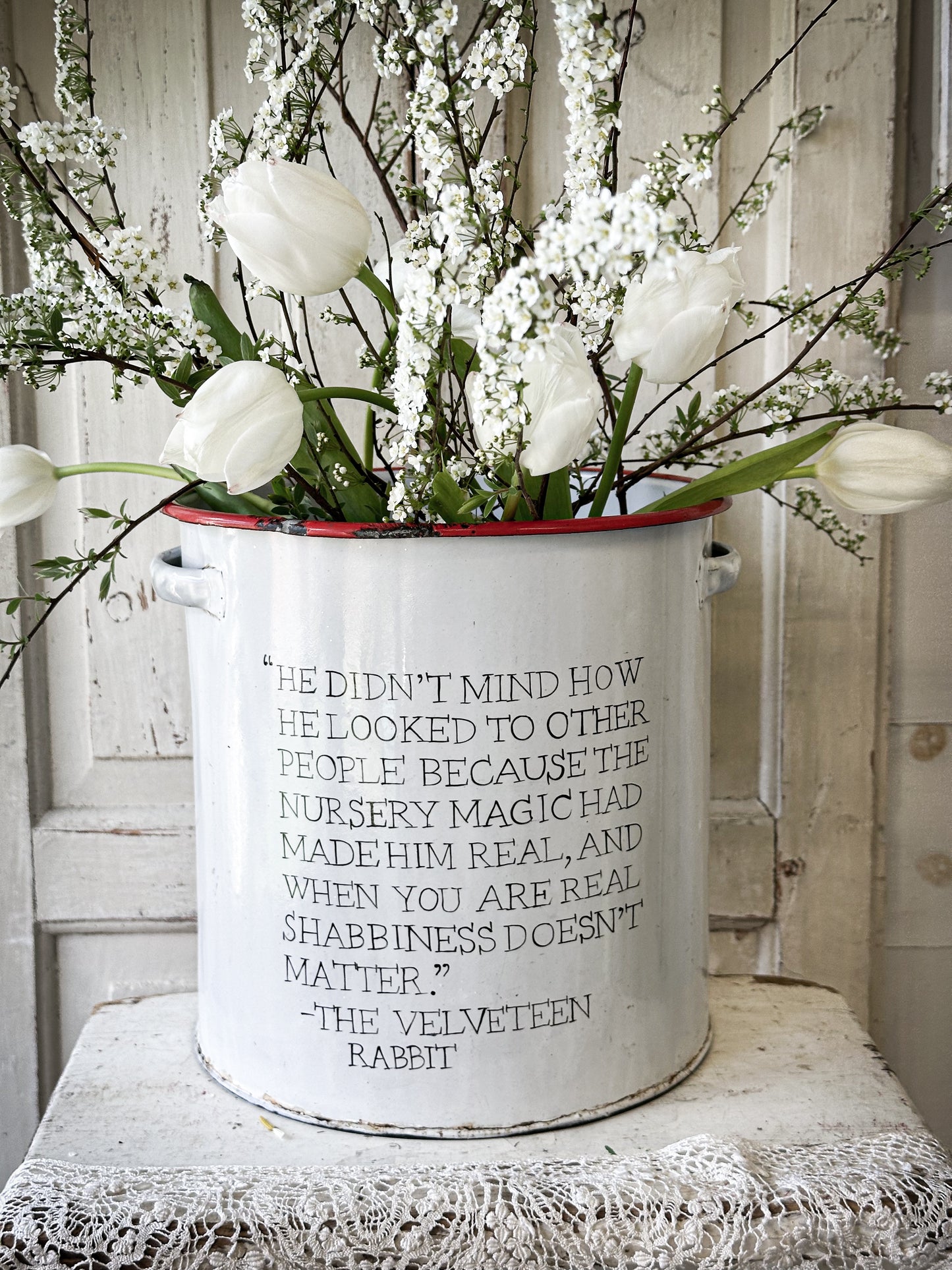 A beautiful vintage enamel canister with Velveteen Rabbit quote