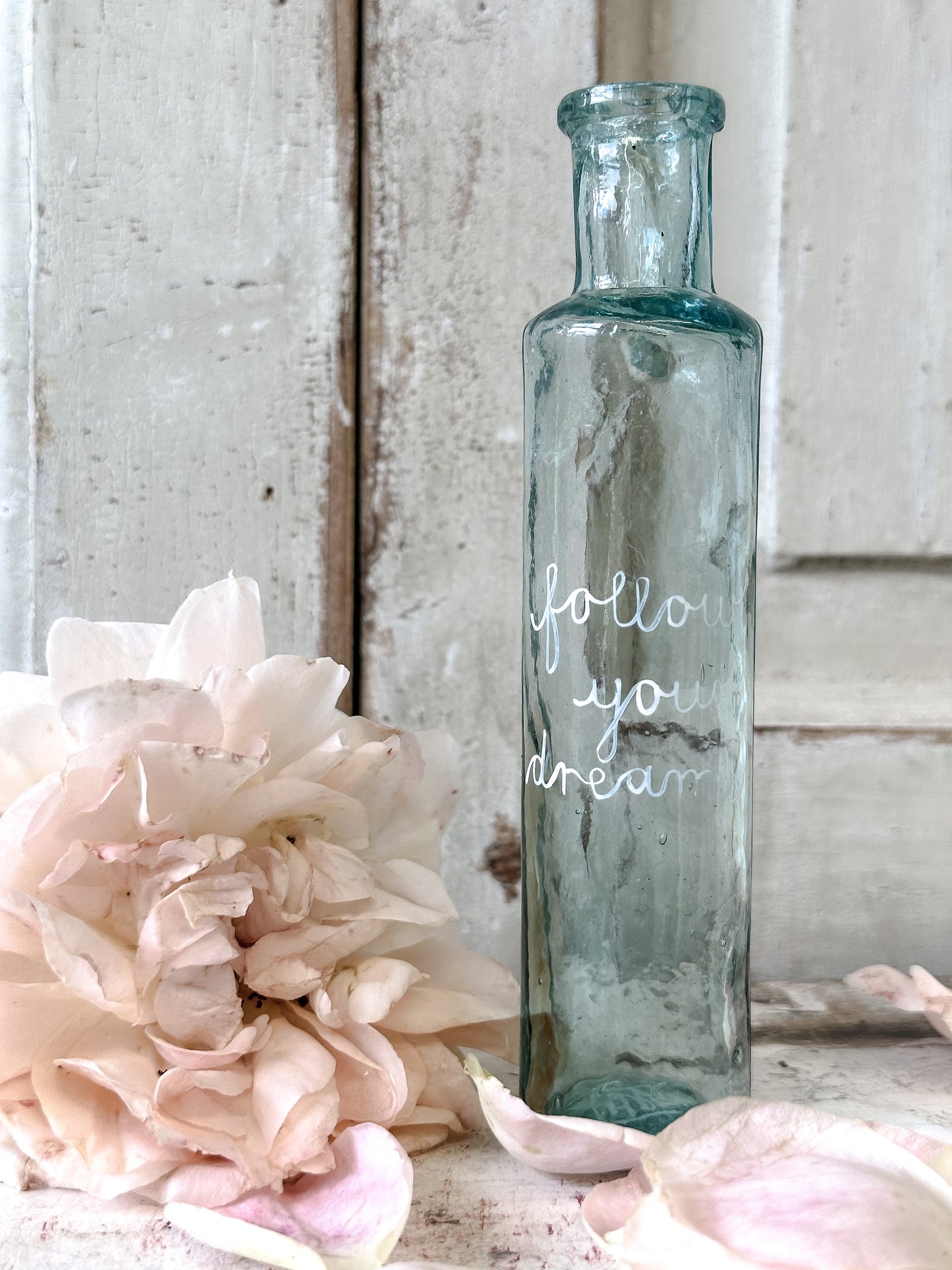 A beautiful Victorian bottle with a hand painted quote