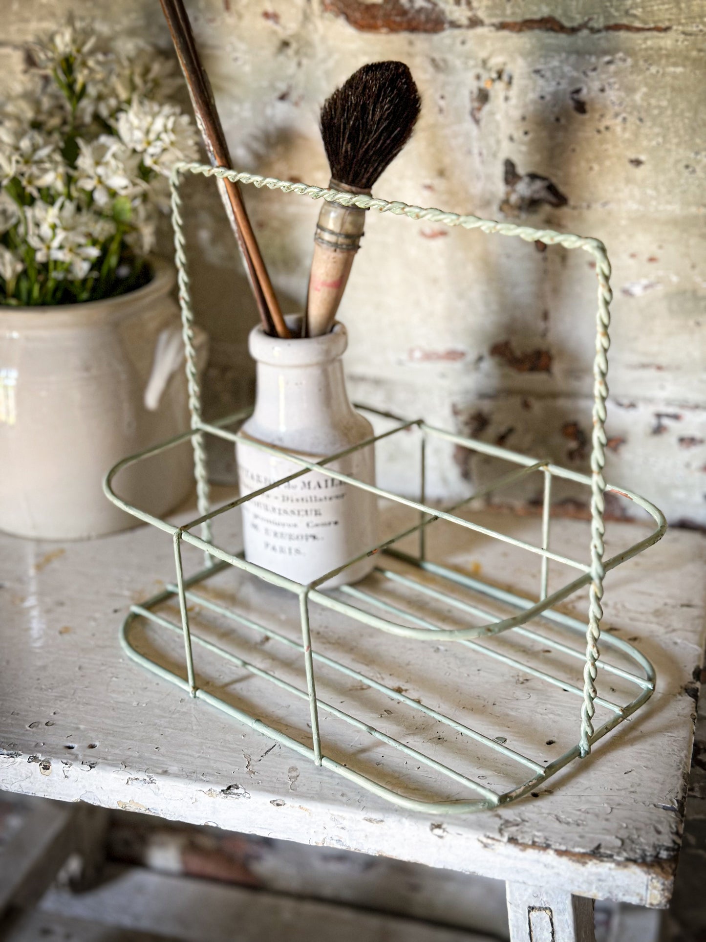 A Vintage French Wire Bottle Rack