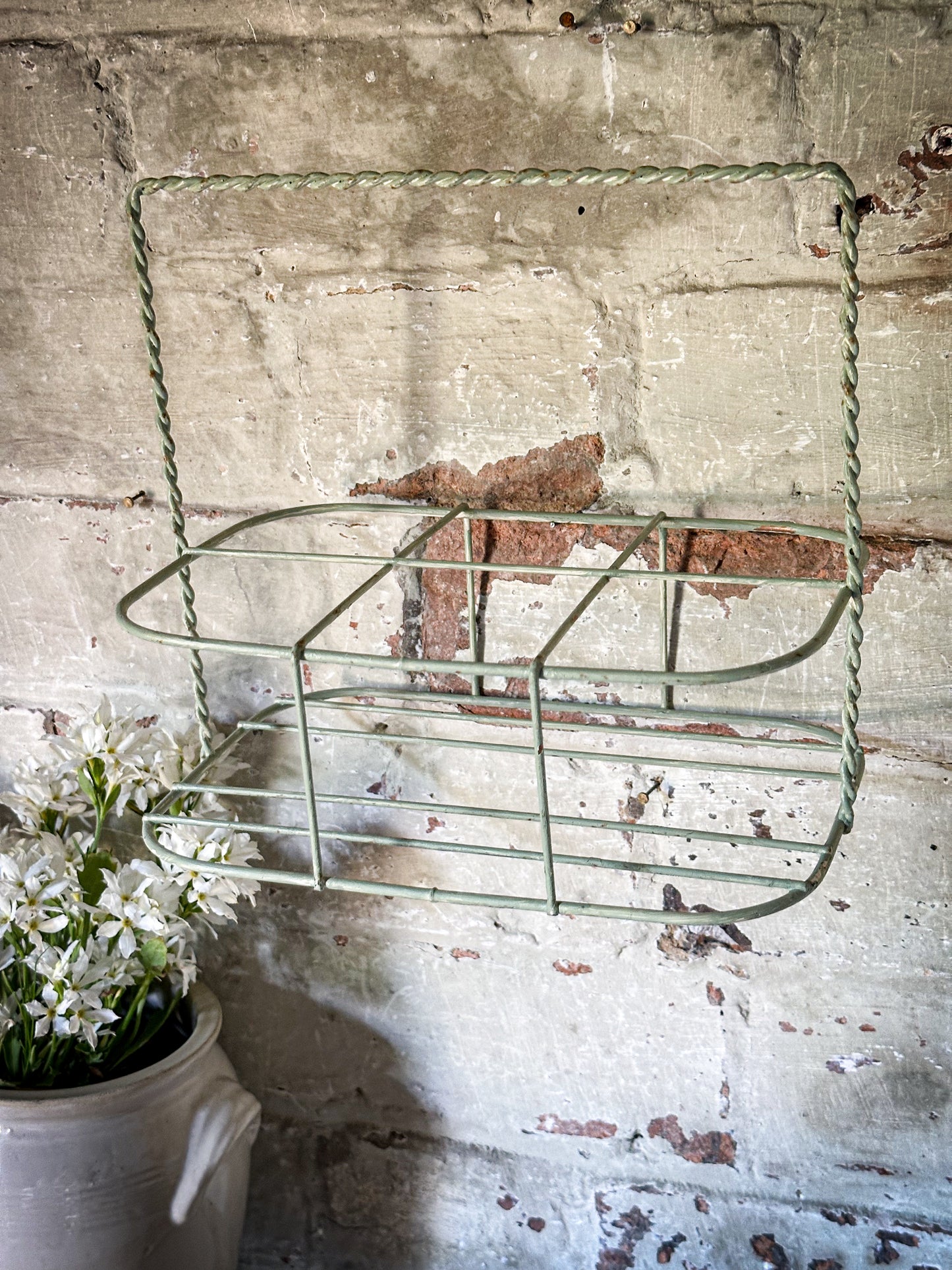 A Vintage French Wire Bottle Rack
