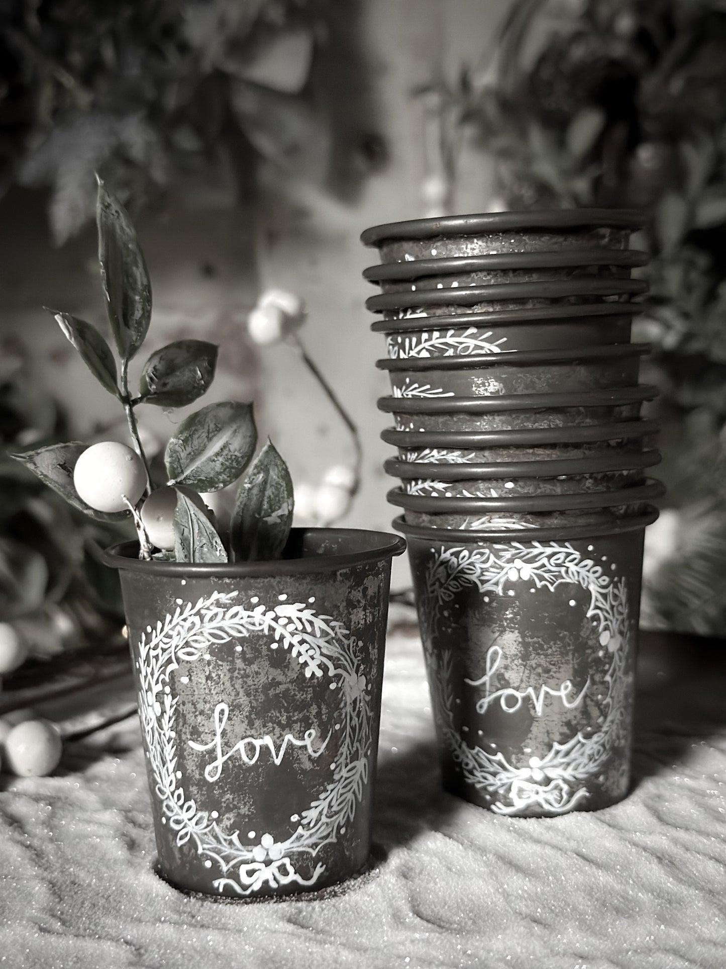A pretty hand painted Dariole tin tea light holder