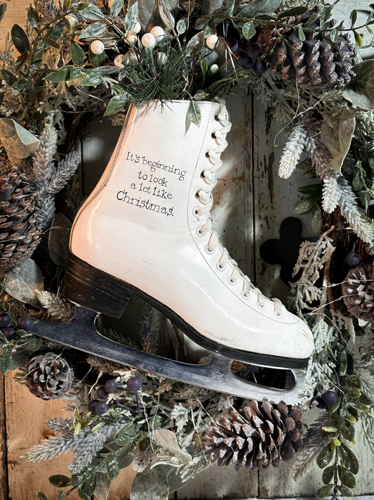A beautiful vintage Christmas ice skate hand painted using traditional sign writer’s techniques and materials