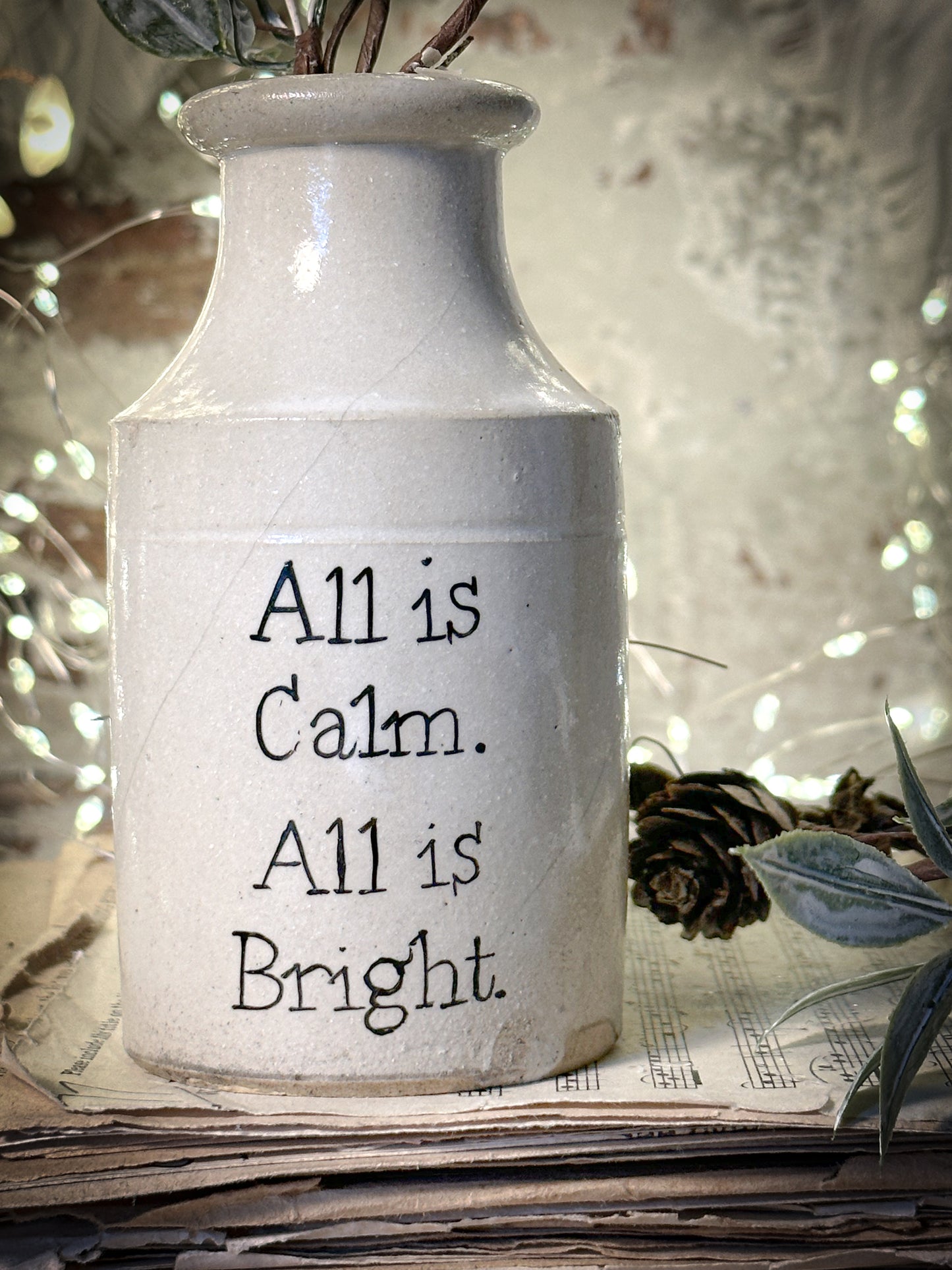 A hand painted vintage Victorian bottle or candle holder