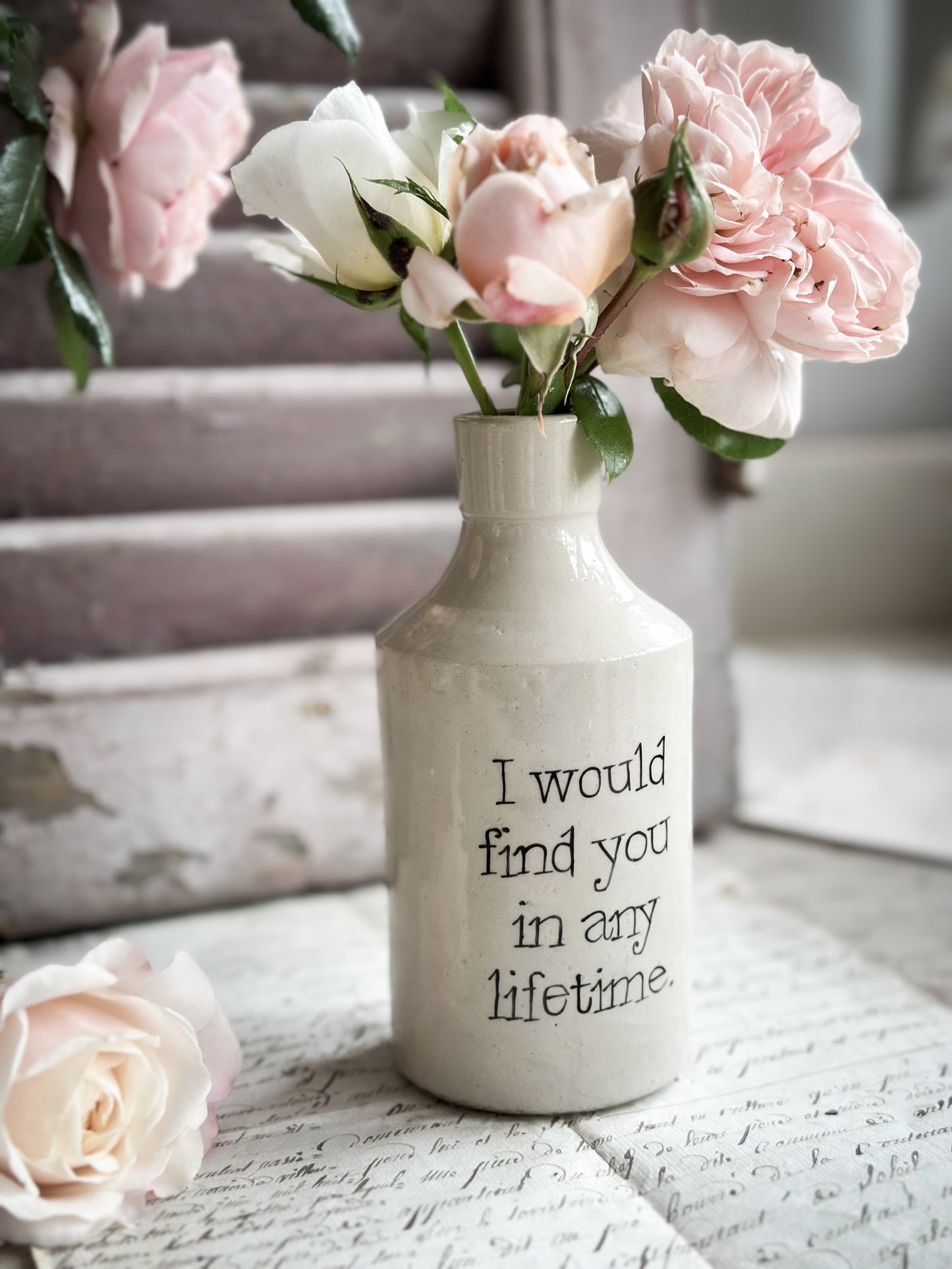 A Victorian unearthed stoneware pottery bottle with a hand painted quote