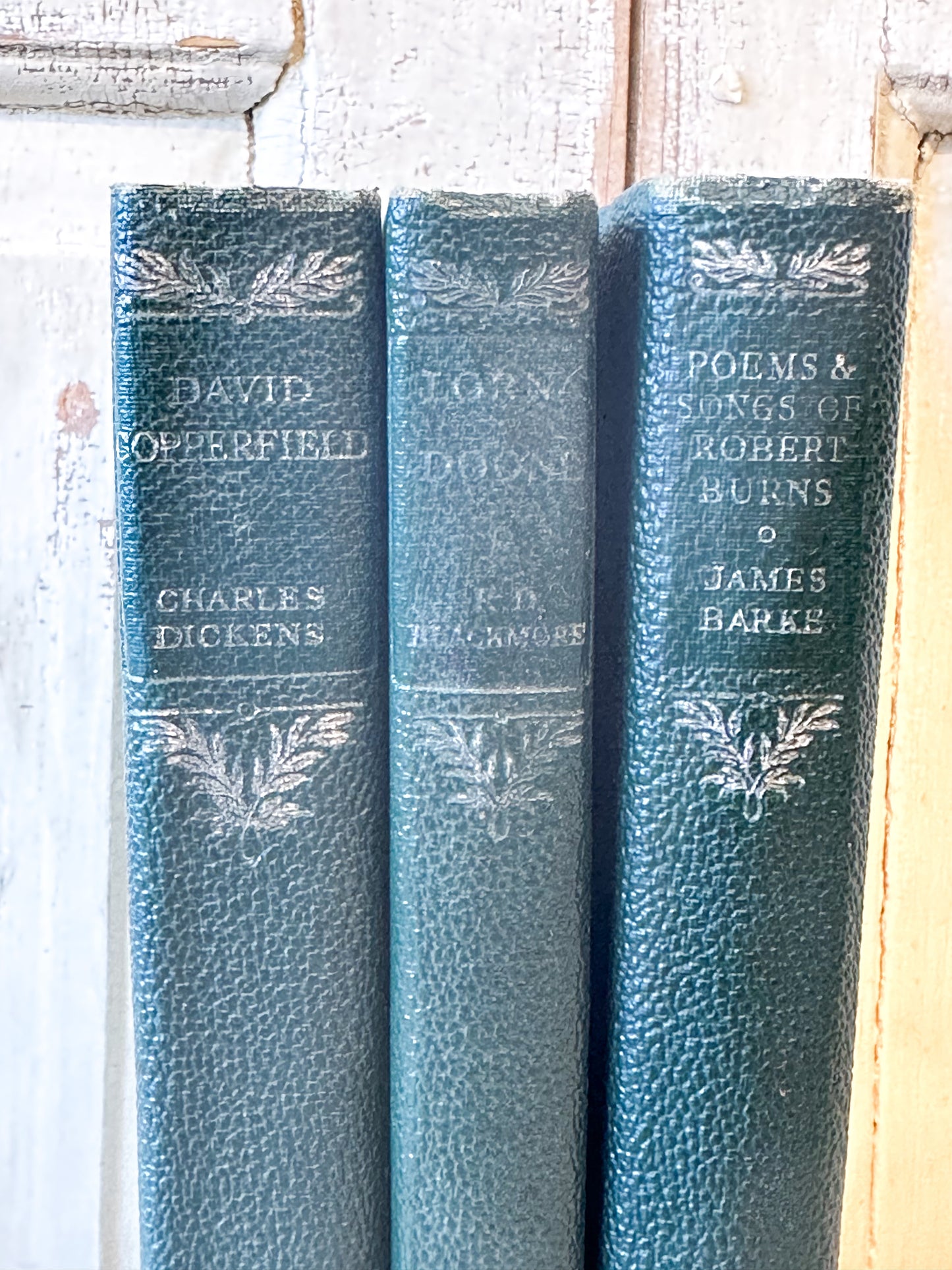 Three Olive Classics books “Lorna Doone” by R.D. Blackmore, “Robert Burnes poems”, “David Copperfield” by Charles Dickens