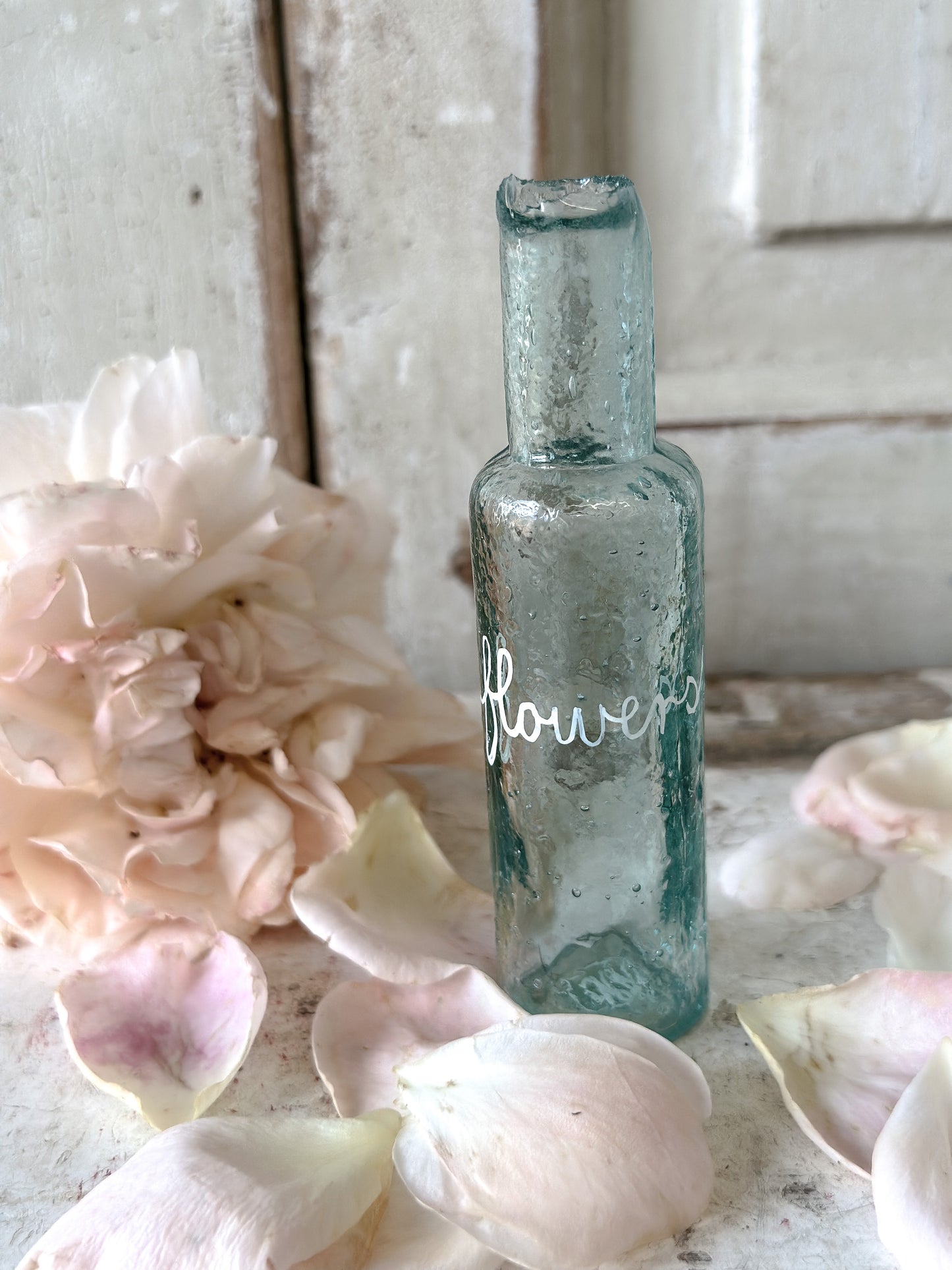 A beautiful Victorian bottle with a hand painted quote