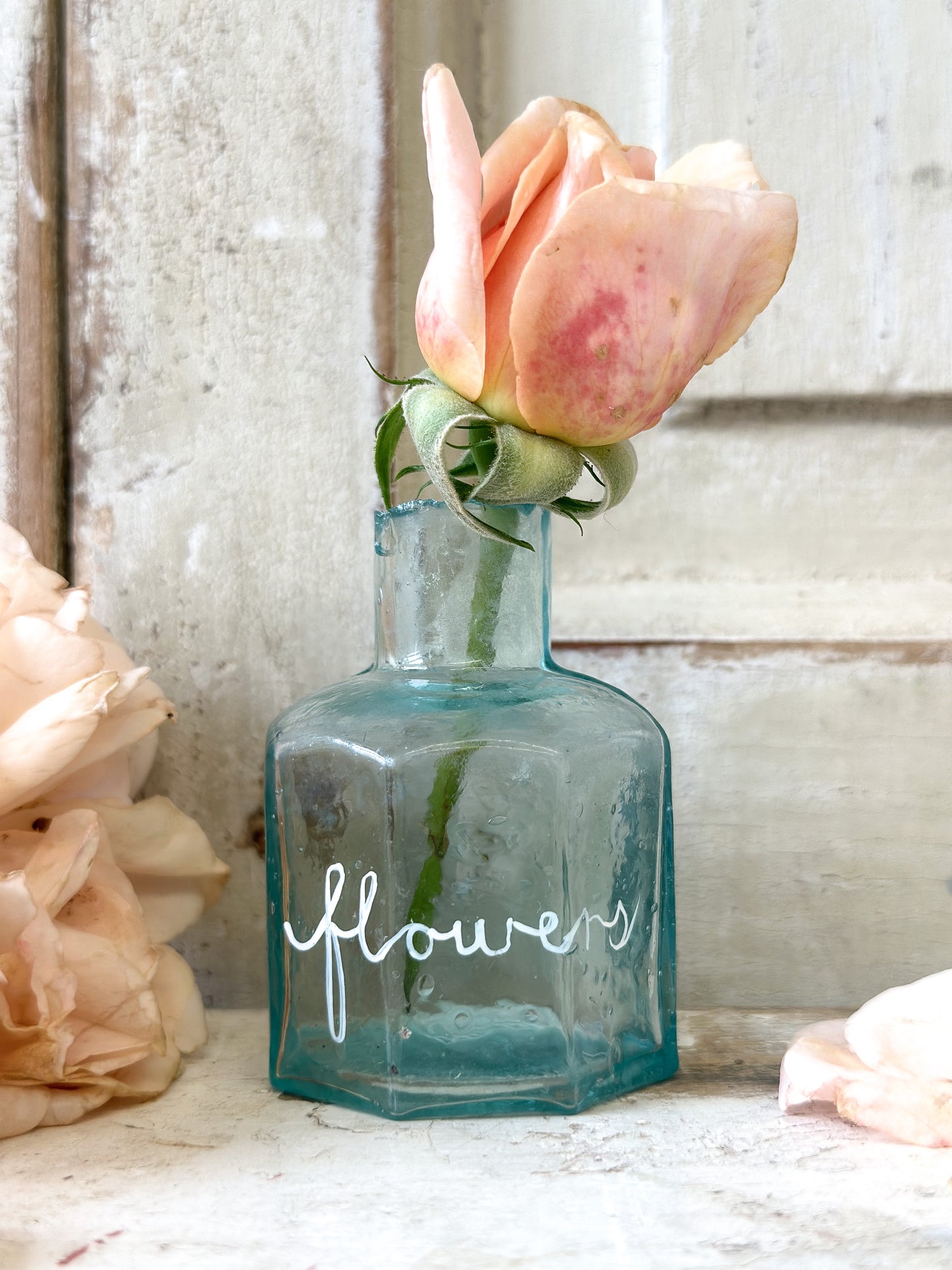 A beautiful Victorian bottle with a hand painted quote