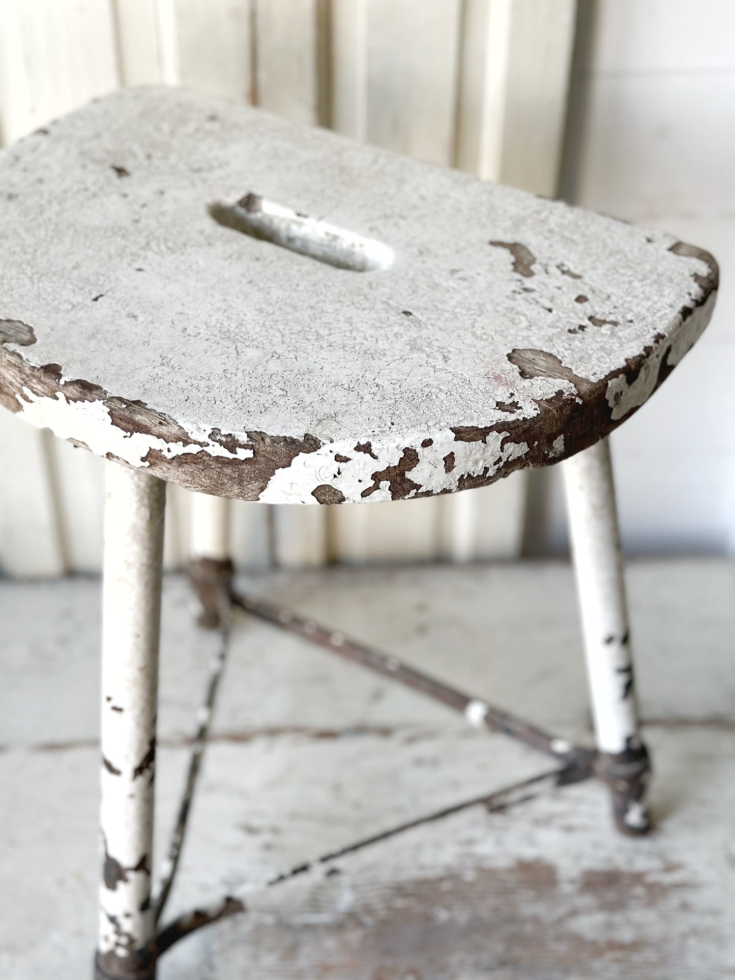 A chippy white French engineer’s stool 1930’s