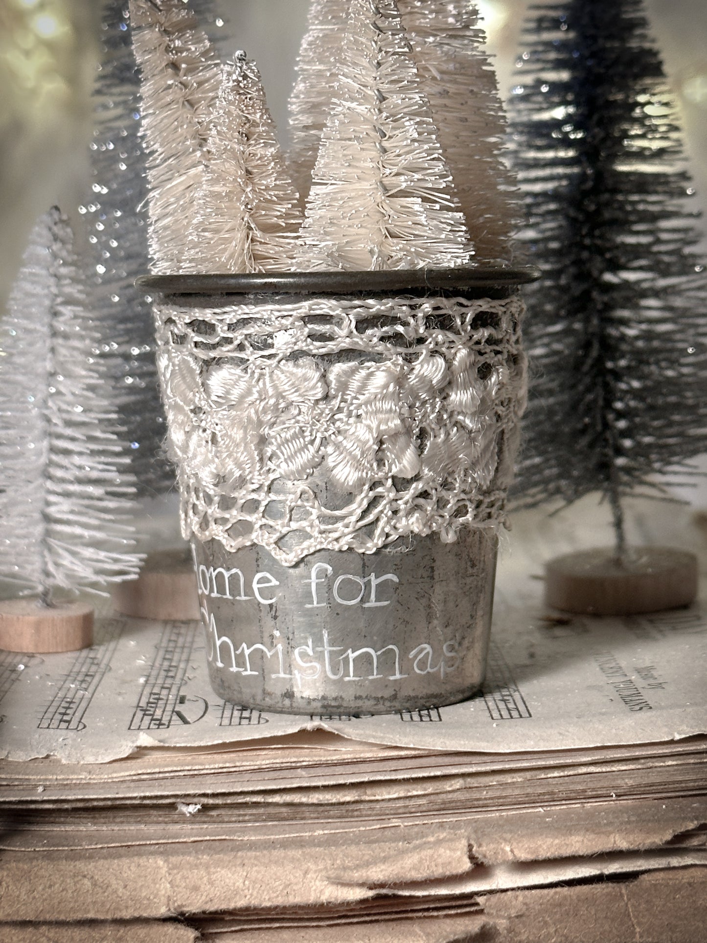 A hand painted vintage Dariole tin with lace trimming and a Christmas quote
